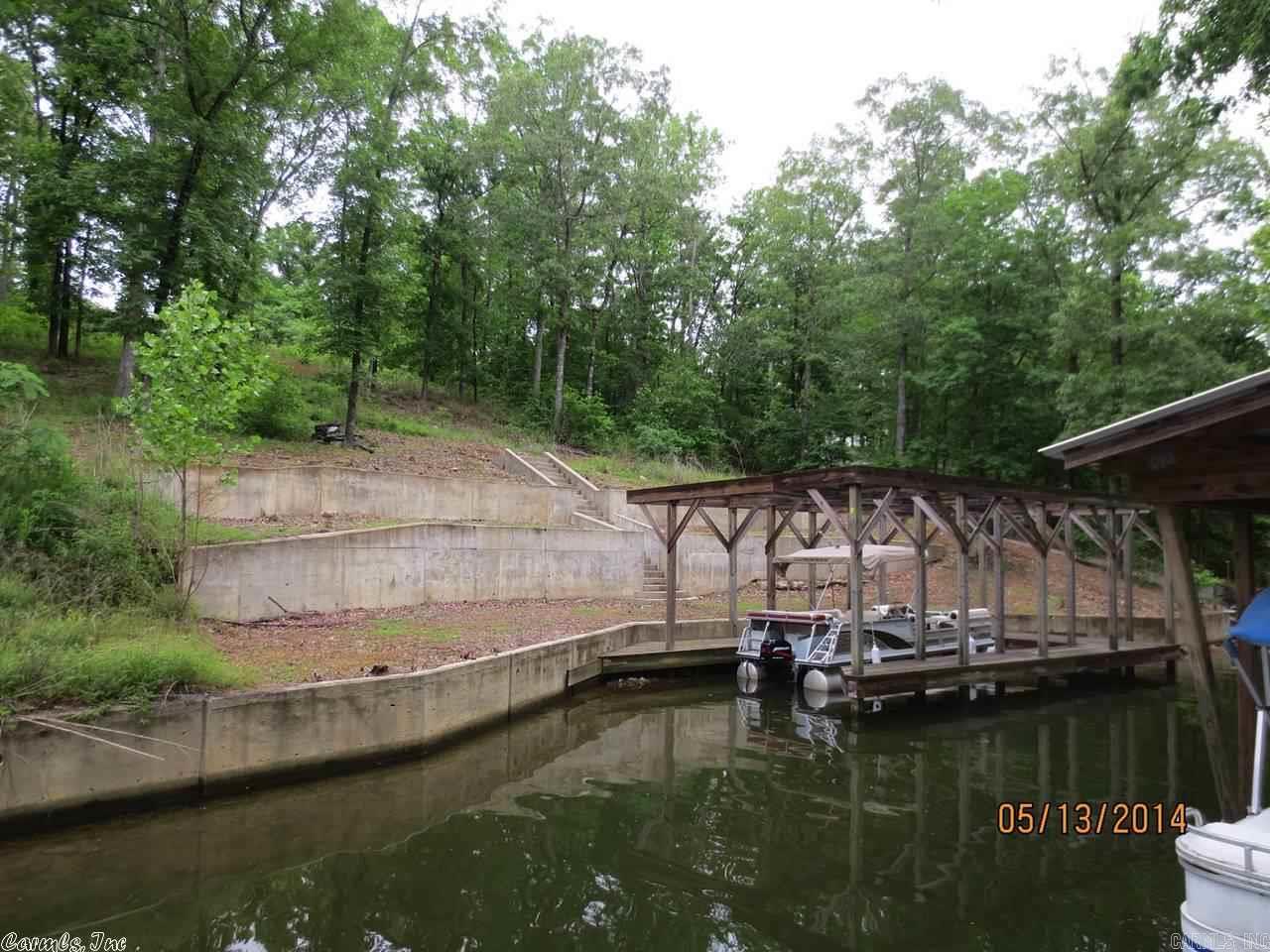 110 FEET LAKE HAMILTON FRONTAGE WITH BOAT DOCK & SEA WALL- READY TO BUILD WITH MOST UTILITIES AVAILABLE--3000 SQUARE FOOT MINIMUM STICK BUILT HOME--LAKESIDE SCHOOL DISTRICT-- COME BUILD YOUR DREAM HOME--