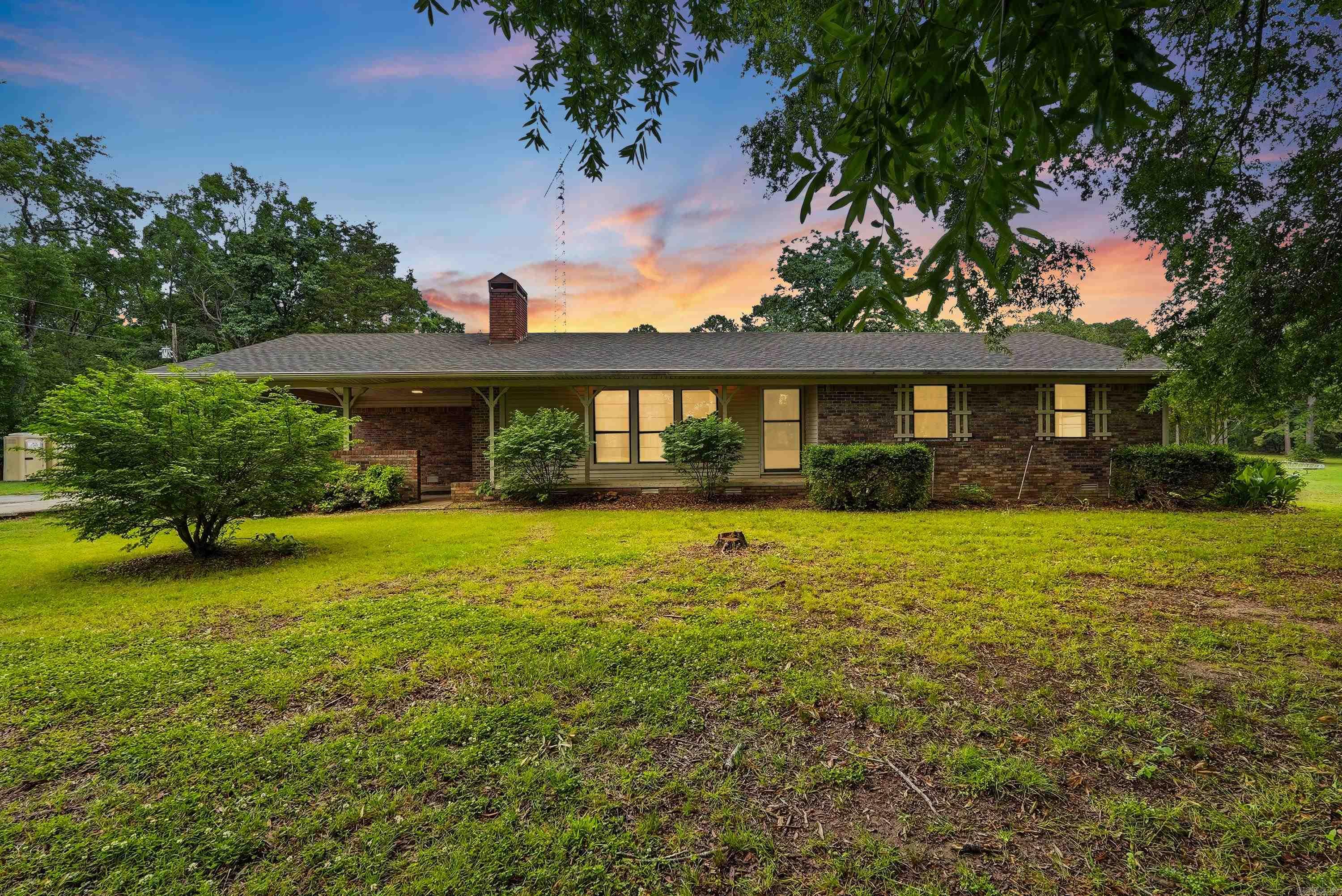 Looking for space, shade, and functionality? This property has it all! Sitting on 6 beautiful acres this 3-bedroom 2 bath home is surrounded by huge oak trees that create aa stunning first impression and peaceful setting you'll love coming home to. This property also has two shops! 30x30 and 40x30. You will have all the room you need for hobbies, equipment, or lake toys. This property also includes a storm shelter that can fit around 10 people. Weather your looking for a full-time residence, a weekend escape near the lake, or property with room to grow this one checks all the boxes! Lake access just up the road just a short drive.