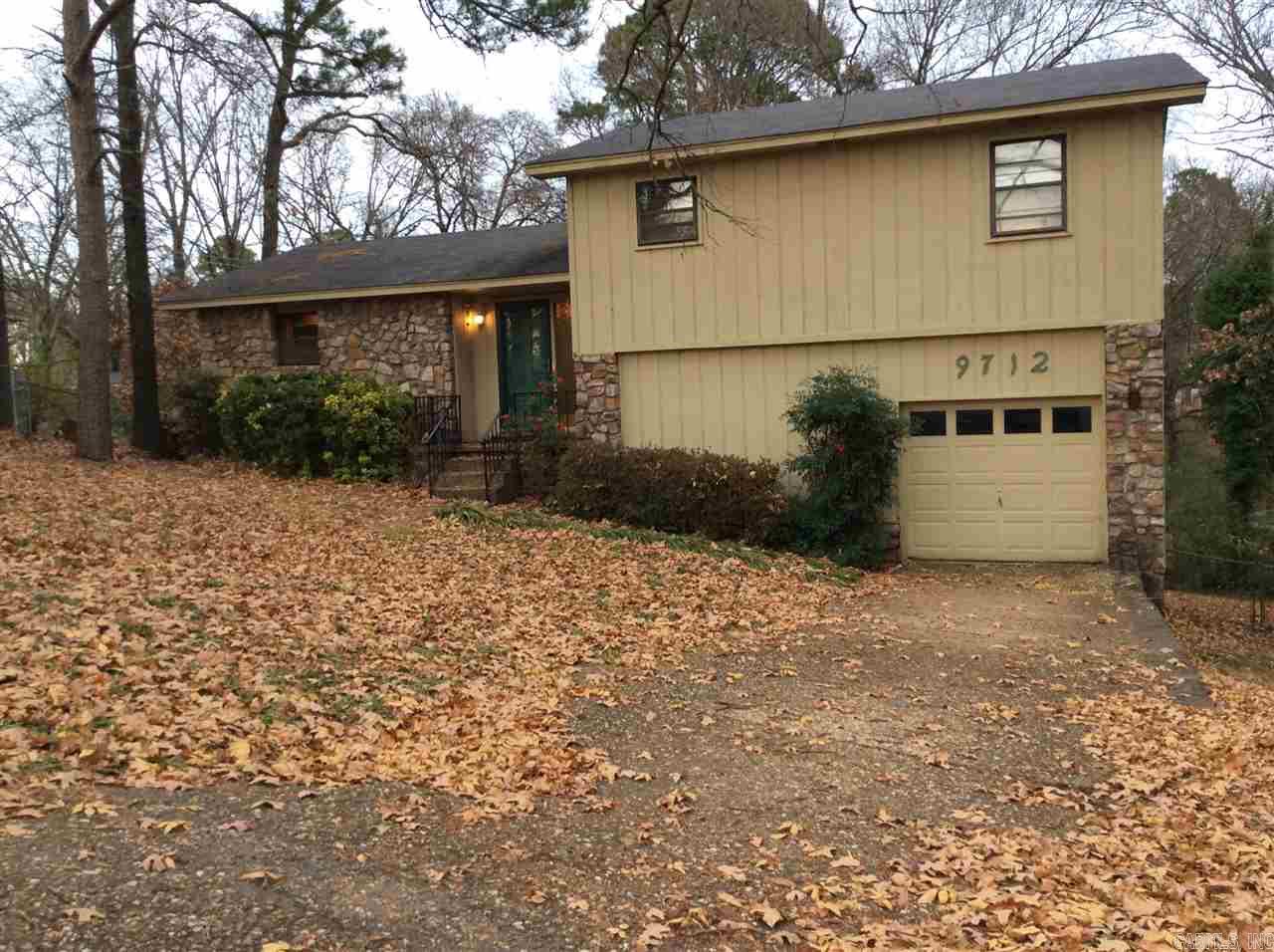 Solid 3 bedroom home.  Terrific investment property or family home that needs TLC. 2 Living areas. Beautiful stone fireplace in the living room. Private large backyard. Separate fenced area for pet.