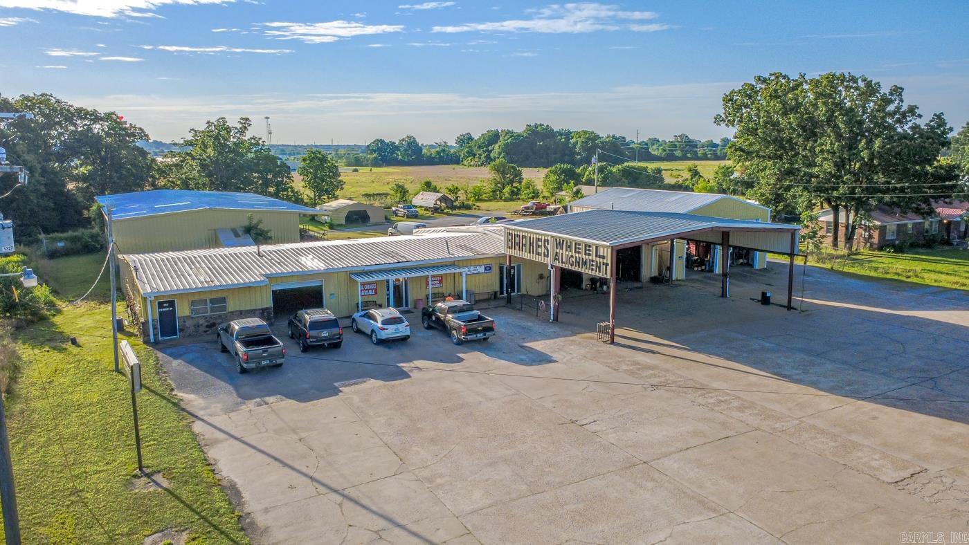 Welcome to Market 3206 Industrial Dr in Jonesboro AR! This 13,417+\- SF metal commercial building offers a versatile setup for a variety of business operations and currently operating as a tire shop. Situated on approximately 1.90+\- acres, the property features three warehouse/storage spaces, a service garage, dedicated office space, and a welcoming lobby/reception area. Additional features include a loading dock, metal canopy, concrete slab foundation throughout, and paved access, providing both functionality and convenience for day-to-day operations. With excellent accessibility and a layout designed to accommodate industrial, service, or distribution uses, this property presents a unique opportunity for an owner-user or investor. Building and land are included in the sale. Inventory and equipment are negotiable and are not included in the list price. Contact the listing agent today for additional details or to schedule a private showing.