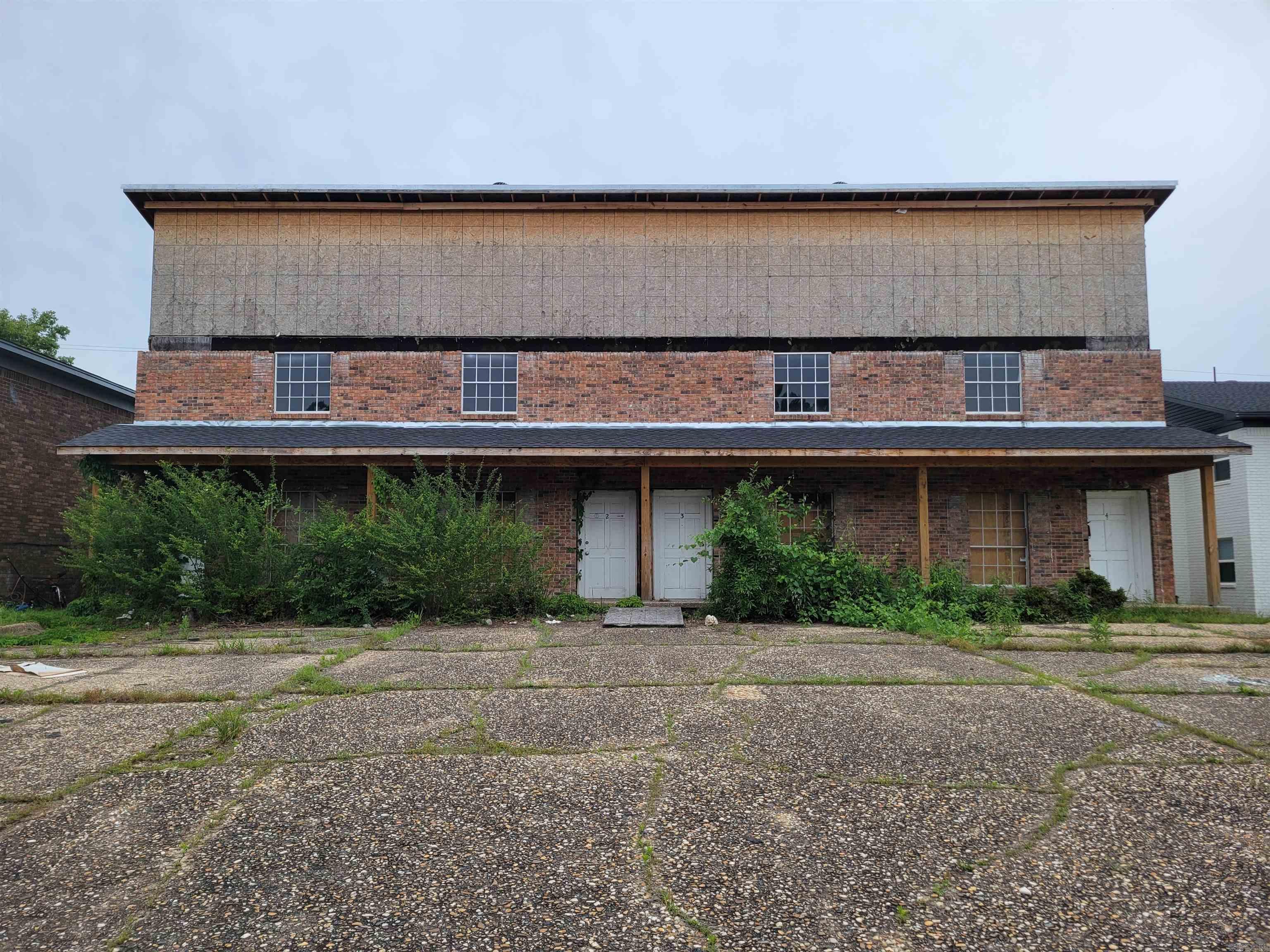 Investor special with serious upside! Welcome to 1806 Sanford Dr, a rare 4-unit multifamily opportunity that has already been gutted to the studs, offering a true blank canvas to design, build, and maximize returns. Major exterior expense already handled with a brand new roof, allowing you to focus your budget on interior finishes. Each of the four units features 2 bedrooms and 1.5 bathrooms with a functional two-story layout, including living space on the main level and all bedrooms upstairs for added privacy. The property also offers ample parking for approximately 8–10 vehicles, making it convenient for tenants and guests. Ideally located with easy access to major roads, shopping, dining, schools, parks, and local employment hubs, this property sits in an area with strong rental demand. With projected rents of approximately $1,300 per unit, the property has the potential to generate $5,200 per month or $62,400 annually once completed, making it an excellent candidate for a BRRRR strategy, long-term hold, or value-add investment. A clean slate with strong income potential—bring your vision and contractor to unlock the full value of this opportunity. END BUYERS ONLY! See remarks.