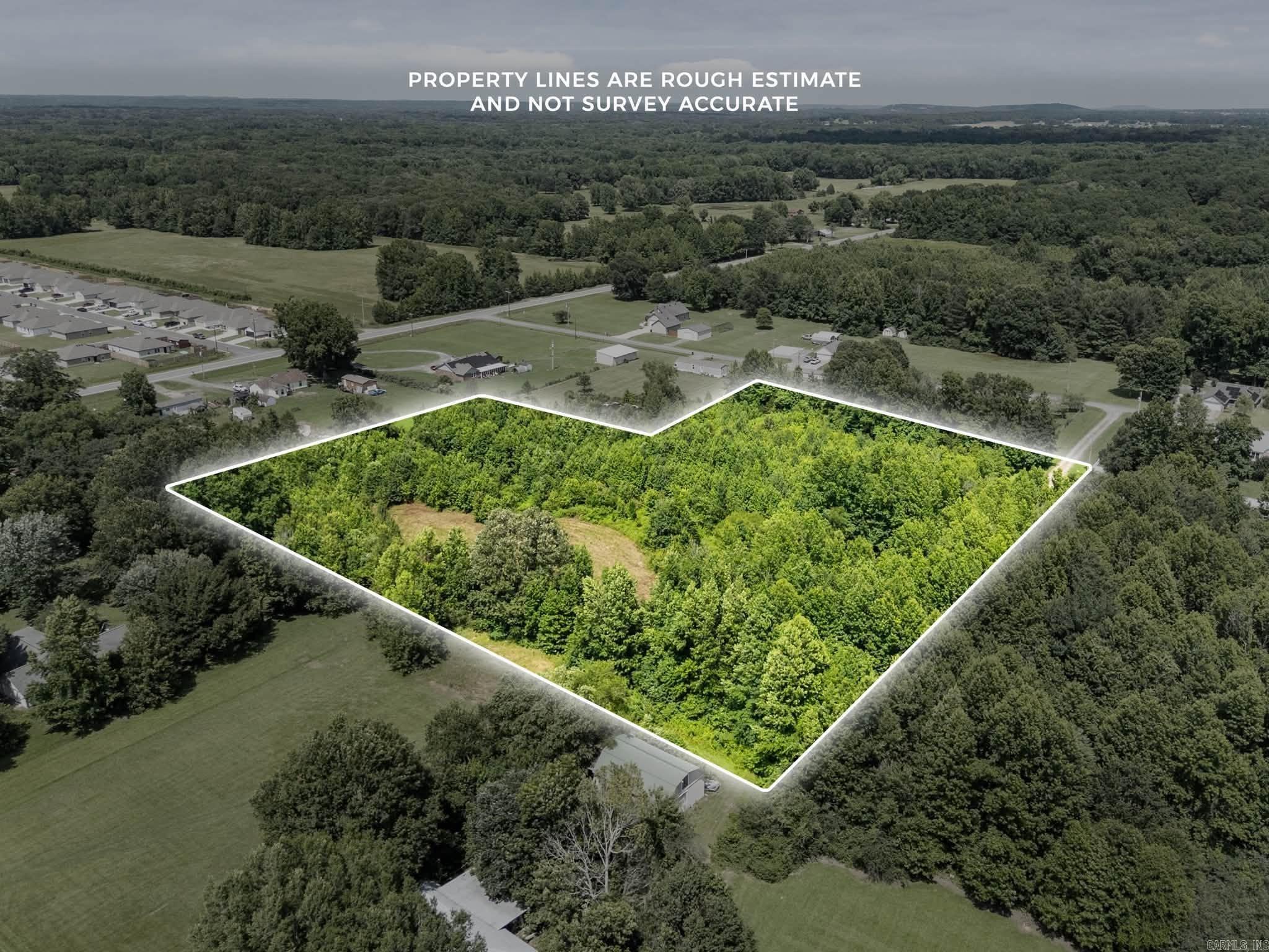 This property is set off the road and is a mixture of pasture and timber. Close to town and all the amenities whether you plan on building your dream home or use it for recreation. Entrance on each side of the property. Ready for Electric and water on both sides of the property.