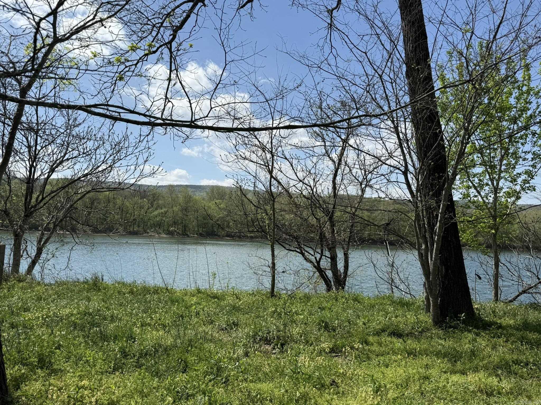 Build your ideal home or weekend retreat just 10 miles from Batesville in Eagle Bottoms Subdivision. The level lot is ready for construction, with covenants ensuring property value through restrictions; the minimum square footage is 800. Residents have access to a private launching ramp, and a public ramp nearby accommodates larger boats. Experience the benefits of river living in this desirable community. Two Lots available!  Lot 7 and 8 available. Price is $40,000 per lot.
