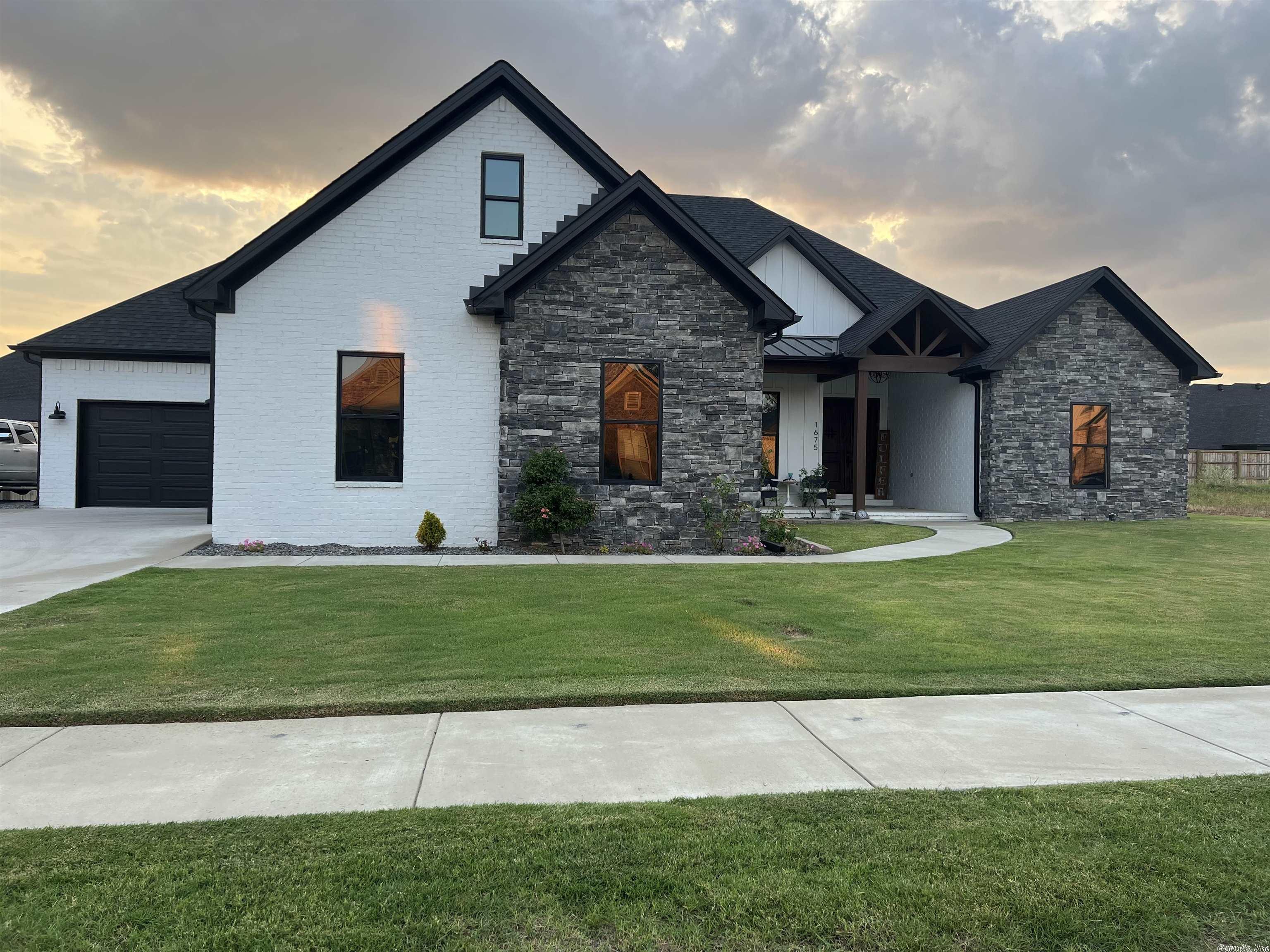 West Conway home built in 2020. Beautiful wood and tile flooring. Open floor plan. 4 bedrooms and office downstairs and playroom or bedroom up.  Upgraded insulation.  3 car garage with insulated doors. Double oven, large pantry, marble countertops and leathered granite, custom cabinets with lots of pullouts to name a few of the extras.