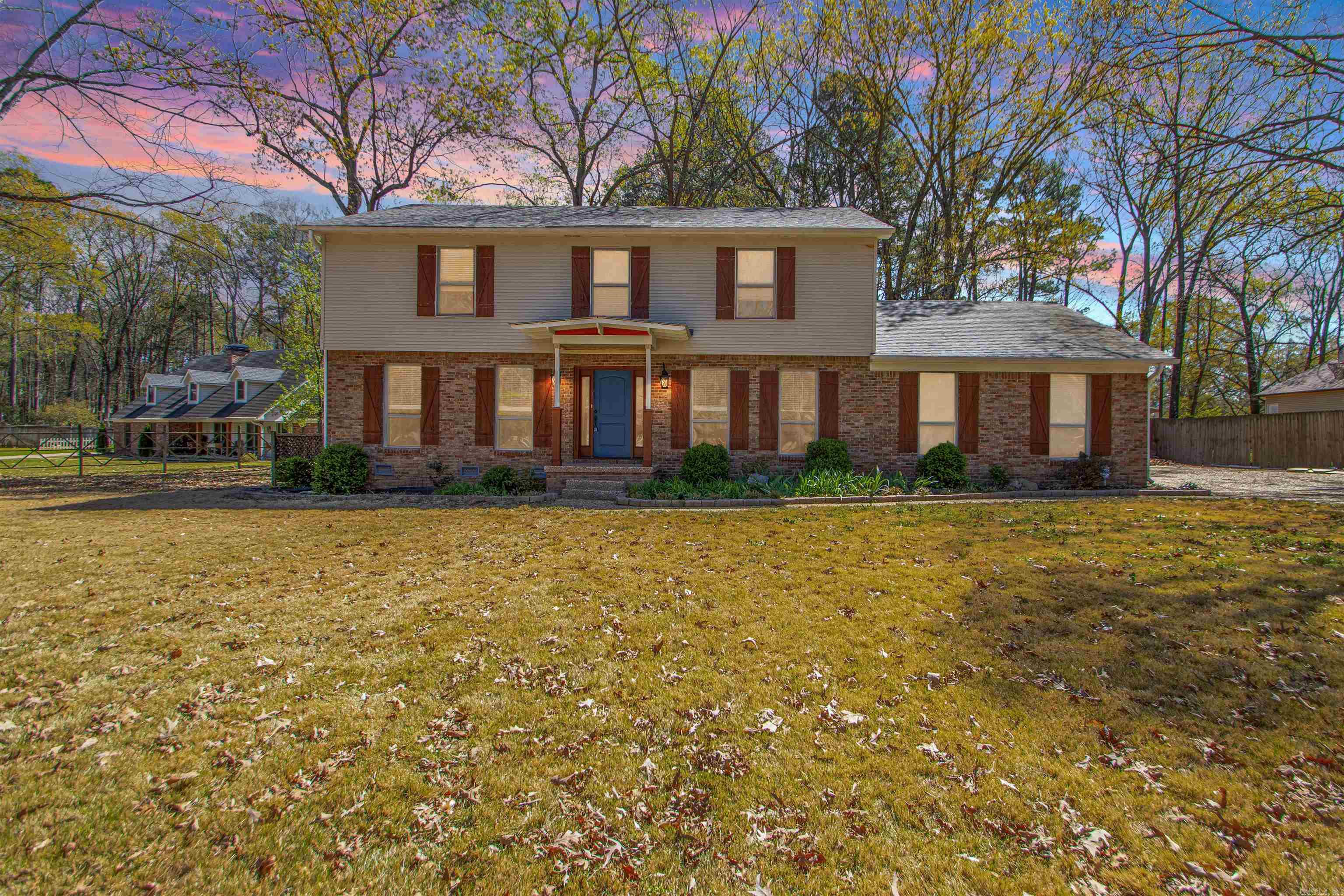 Tucked at the end of a quiet cul de sac on nearly half an acre, this 4 bedroom, 2.5 bath home offers space to spread out while staying just moments from Maumelle Country Club and the golf course. Inside, the main level feels warm and inviting with wood floors and a flexible front living space that easily becomes a home office or playroom. The den anchors the home with beamed ceilings, a brick fireplace, and built ins that create a place to gather and slow down. The kitchen features granite countertops, maple cabinetry, and stainless appliances, with a large laundry room nearby that offers additional space for storage or a secondary workspace. Upstairs, all bedrooms are generously sized, now featuring brand new carpet throughout, including the stairs, creating a soft and comfortable feel. The primary suite offers a massive walk in closet designed for everyday ease. Step outside to a back deck with new decking, ready for quiet mornings or evenings with friends, all overlooking a backyard with plenty of room to add a pool or create your own outdoor retreat. Book your showing today!
