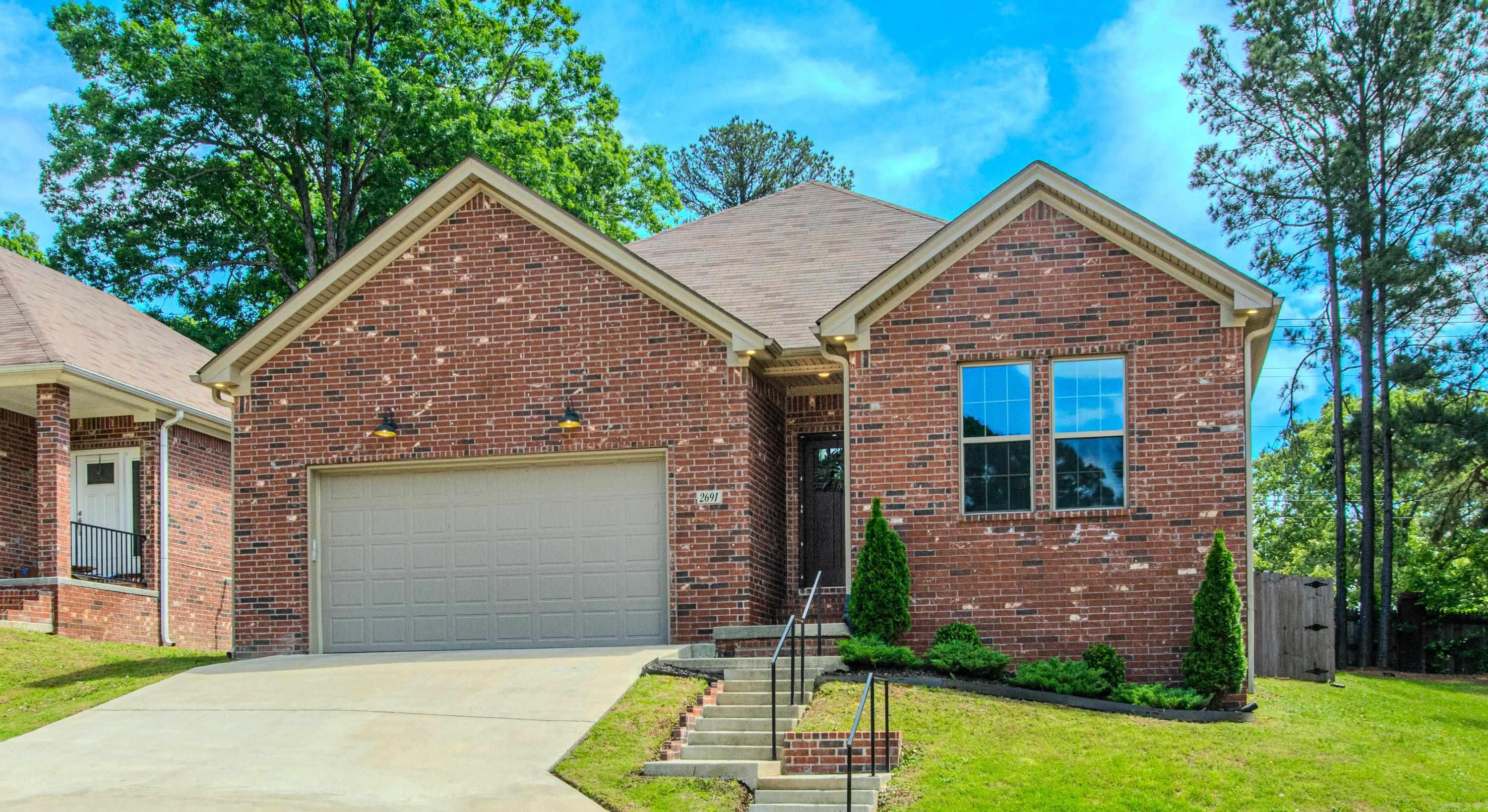 This is the one! This gorgeous brick home is packed with style, character and all the cozy vibes. The open layout is perfect for entertaining, featuring a stunning living room with custom built-ins and fireplace plus a dreamy kitchen with a huge island! The dining room looks straight out of Pinterest with custom shelving, oversized windows and beautiful natural light. The spacious primary suite feels like a private retreat with a spa-worthy tiled walk-in shower. (tankless water heater) Warm, inviting and completely move-in ready, this home is ready to impress from the moment you walk-in! Great, small subdivision and home in cul-de-sac too!