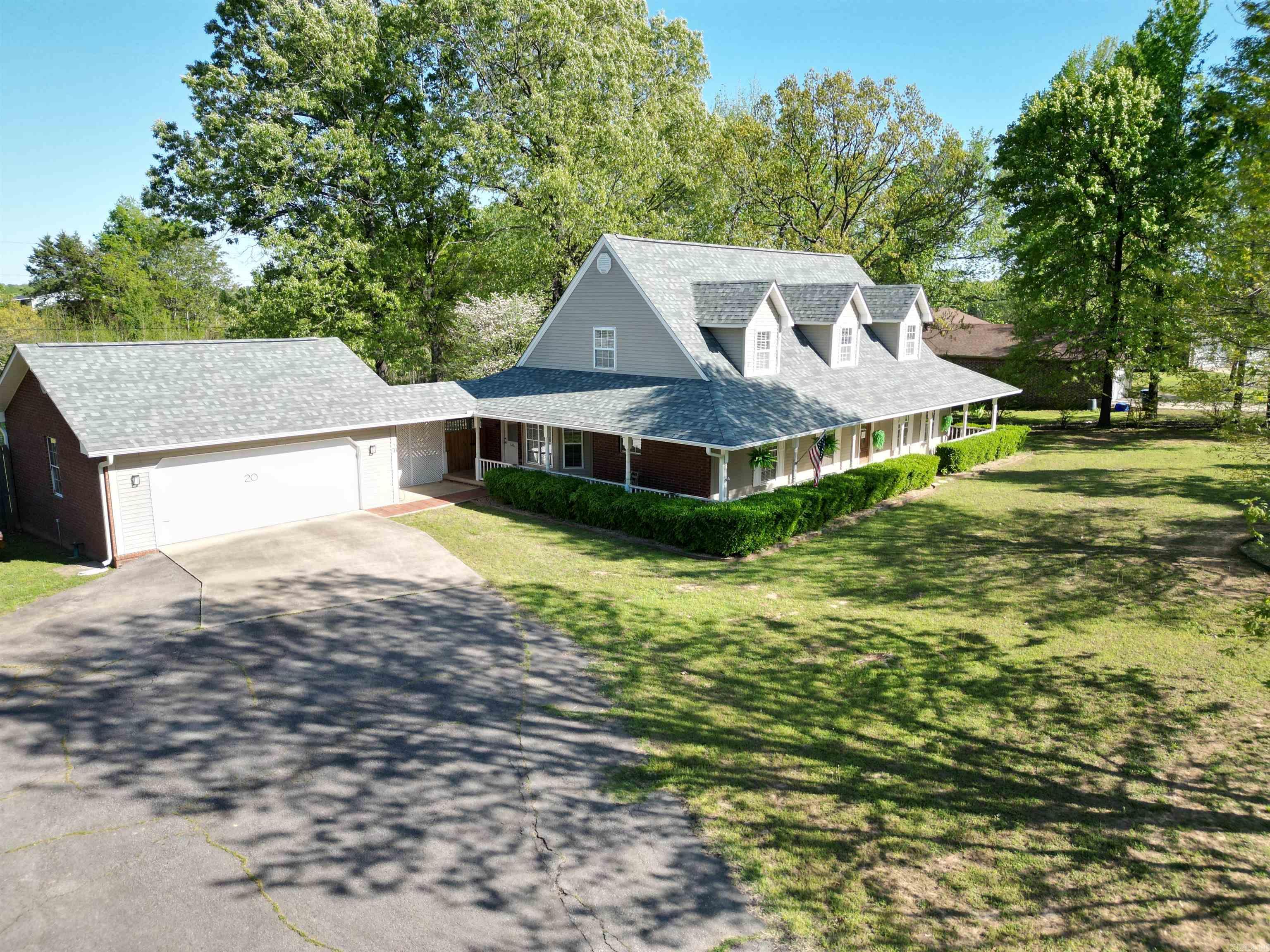 This all electric, large 3 bed 2.5 home on almost an acre in town in Clarksville has a huge kitchen and fenced backyard with deck as the stars. Kitchen boasts a granite. island with adjustable cabinets, space for 8 seat table in breakfast area, separate coffee bar, and lots of natural light. In addition to the big breakfast area, there is a separate dining room that could also be used as a home office. Large primary suite is on the first floor with jetted tub and step-in tiled shower. Brand new 30 year architectural shingle roof, gutters, and downspouts give peace of mind. Water heater new in 2022. Upstairs you will find 2 bedrooms with granite Jack and Jill bathroom. Come winter, cozy up in front of the woodburning fireplace in the living room. The detached 2 car garage holds full size pickup truck.