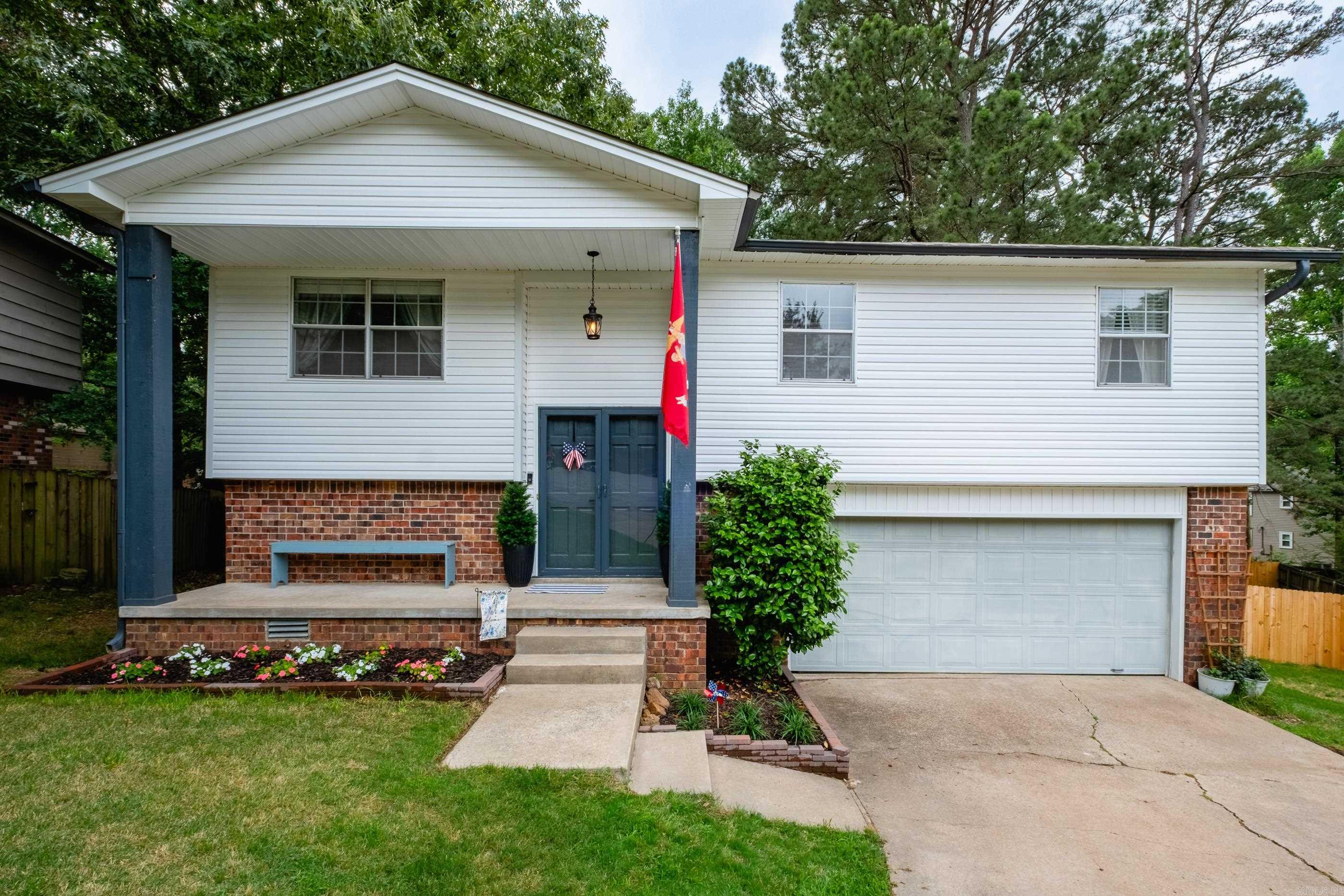 West Little Rock home conveniently located near shopping, restaurants and freeway access. Situated on the main level are the primary bedroom/bath, 2 additional bedrooms, hall bath, living, kitchen, dining and deck. The lower level has the 4th bedroom, half bath and an additional living space with a fireplace. New lux vinyl flooring has been installed, along with fresh paint, blinds and kitchen stove/microwave. Lighting, bathroom vanities, kitchen countertops are a few other updates.