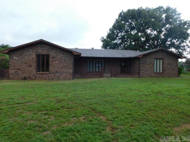 Beautiful country setting.  Home sits well of the road and has large covered patio that overlooks a pasture.  Large family room with gas log fireplace.  Nice shop with lean to for all your hobbies and lawn equipment.