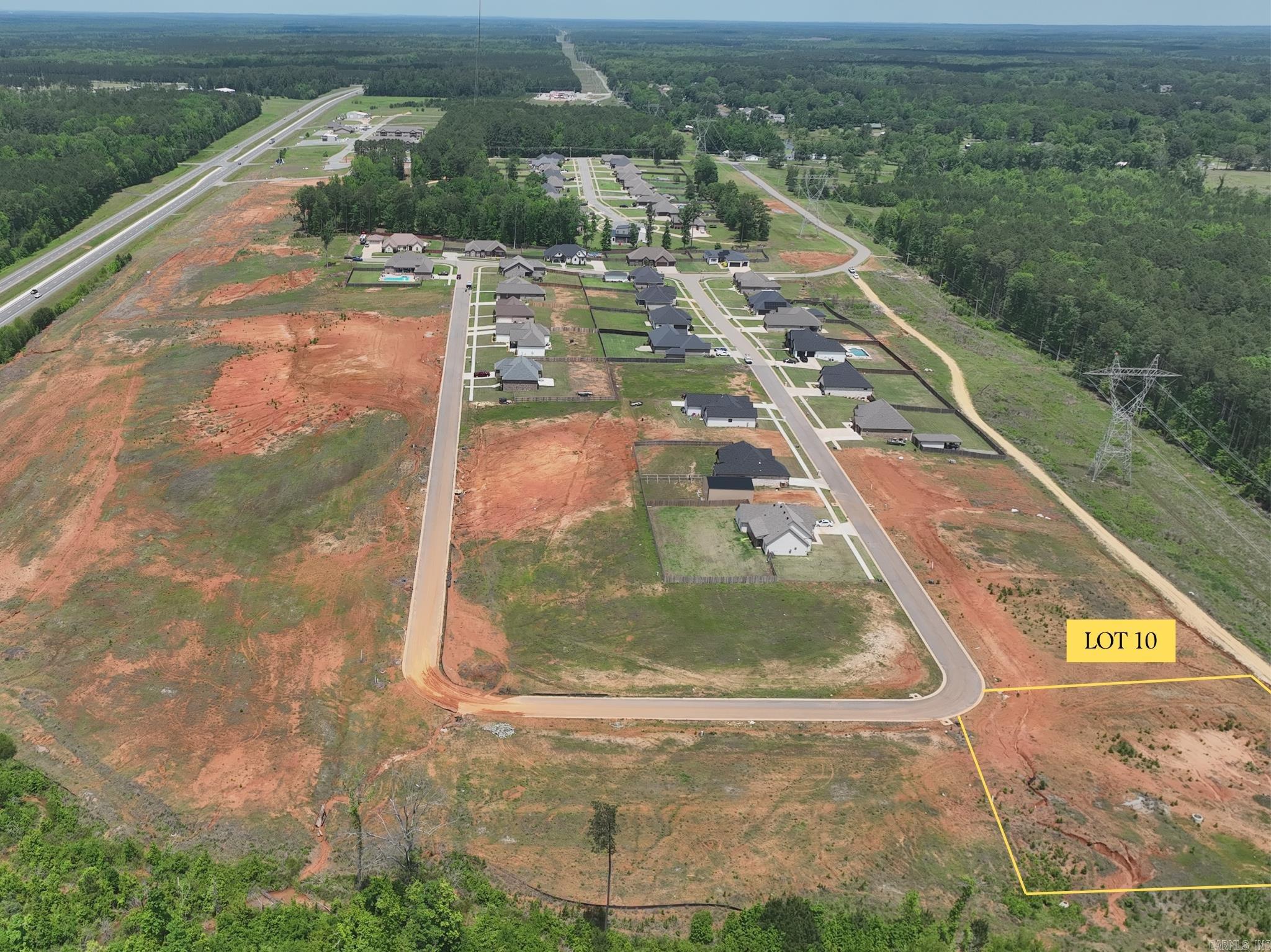 Build your future home in the peaceful Oak Tree South subdivision in Sheridan, Arkansas. Lot 10 offers a convenient location just minutes from Hwy 167, providing quick access to Sheridan, Little Rock, and surrounding areas while still enjoying a quiet residential setting. This homesite combines small-town comfort with easy access to shopping, dining, schools, and everyday amenities. Don’t miss this opportunity to own a residential lot in one of Sheridan’s growing areas.