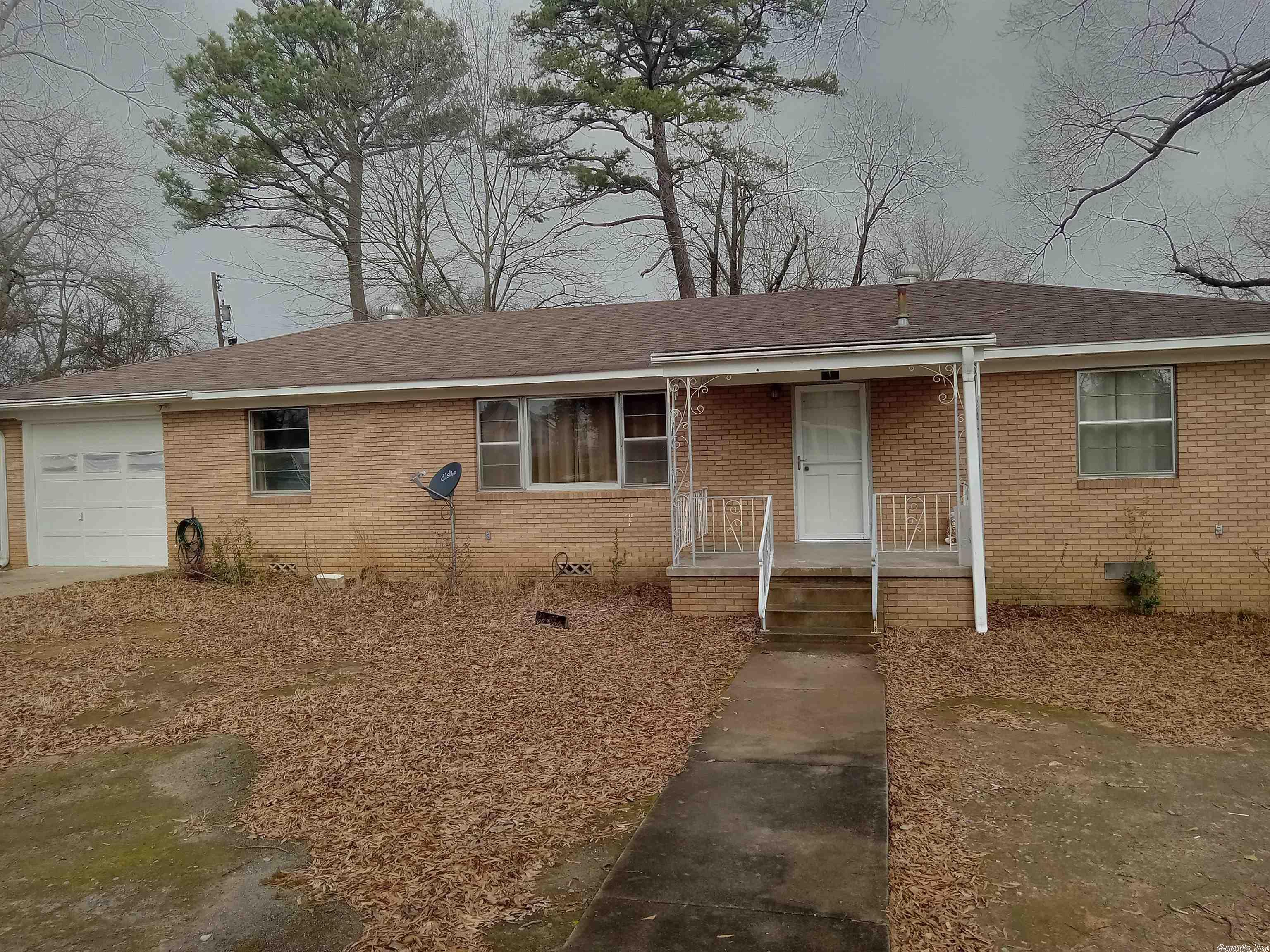 3 Bedrooms 2 Bath 1 car garage home sitting on a private drive. This one has 2 separate shops.