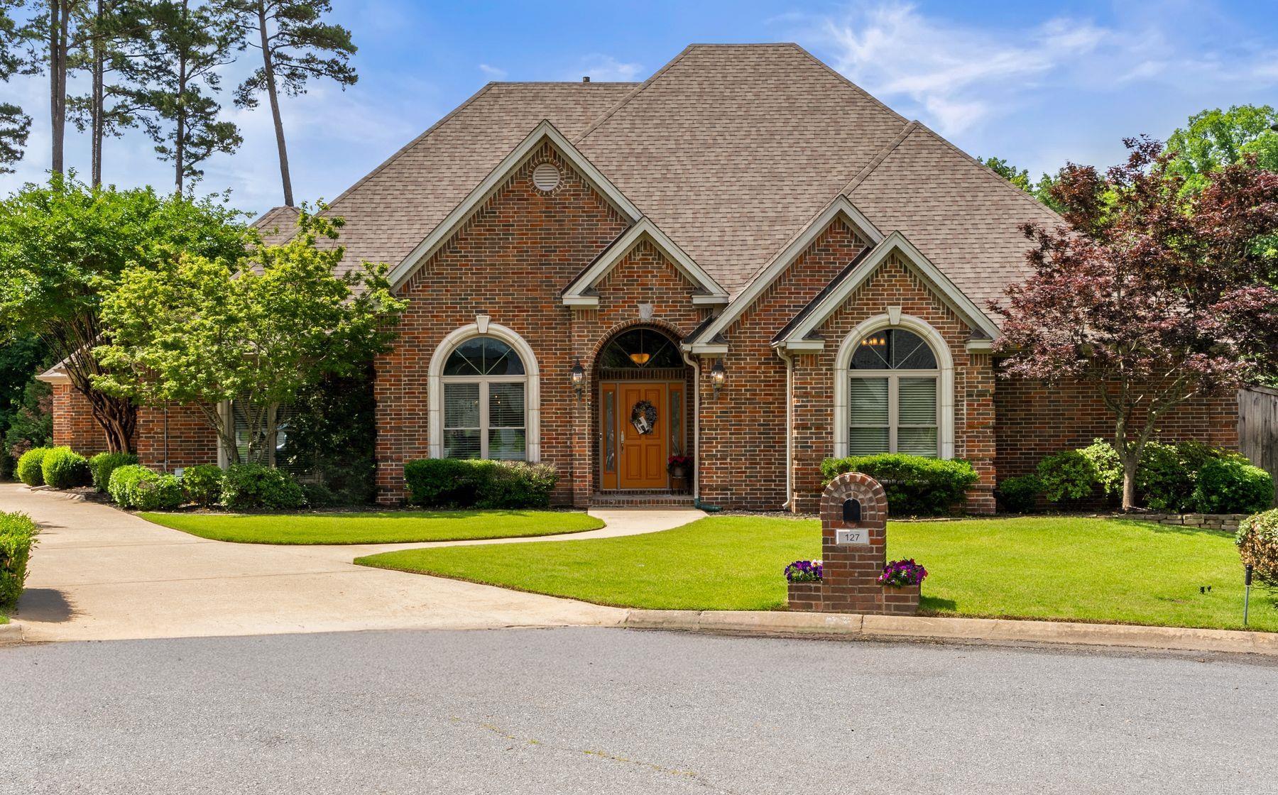 Welcome to 127 Grenoble Circle in beautiful Maumelle! This spacious 4-bedroom, 3.5-bath home offers 3,553 square feet of comfortable living with stunning golf course views and resort-style outdoor living. Backing directly to the Country Club of Arkansas golf course, this property features a beautiful in-ground pool, covered patio, and outdoor kitchen—perfect for entertaining or relaxing while enjoying the peaceful scenery. Inside, you’ll find large rooms throughout, generous closets, and plenty of storage space. The oversized eat-in kitchen is designed for gathering and includes stainless steel appliances, abundant cabinetry, and ample counter space. The functional floor plan provides room for everyone with spacious bedrooms and multiple living areas ideal for both everyday living and hosting guests. A rear-entry 2-car garage adds convenience and curb appeal. Whether you’re enjoying mornings overlooking the fairway or evenings by the pool, this home offers the perfect combination of comfort, space, and outdoor enjoyment in one of Maumelle’s most desirable locations.
