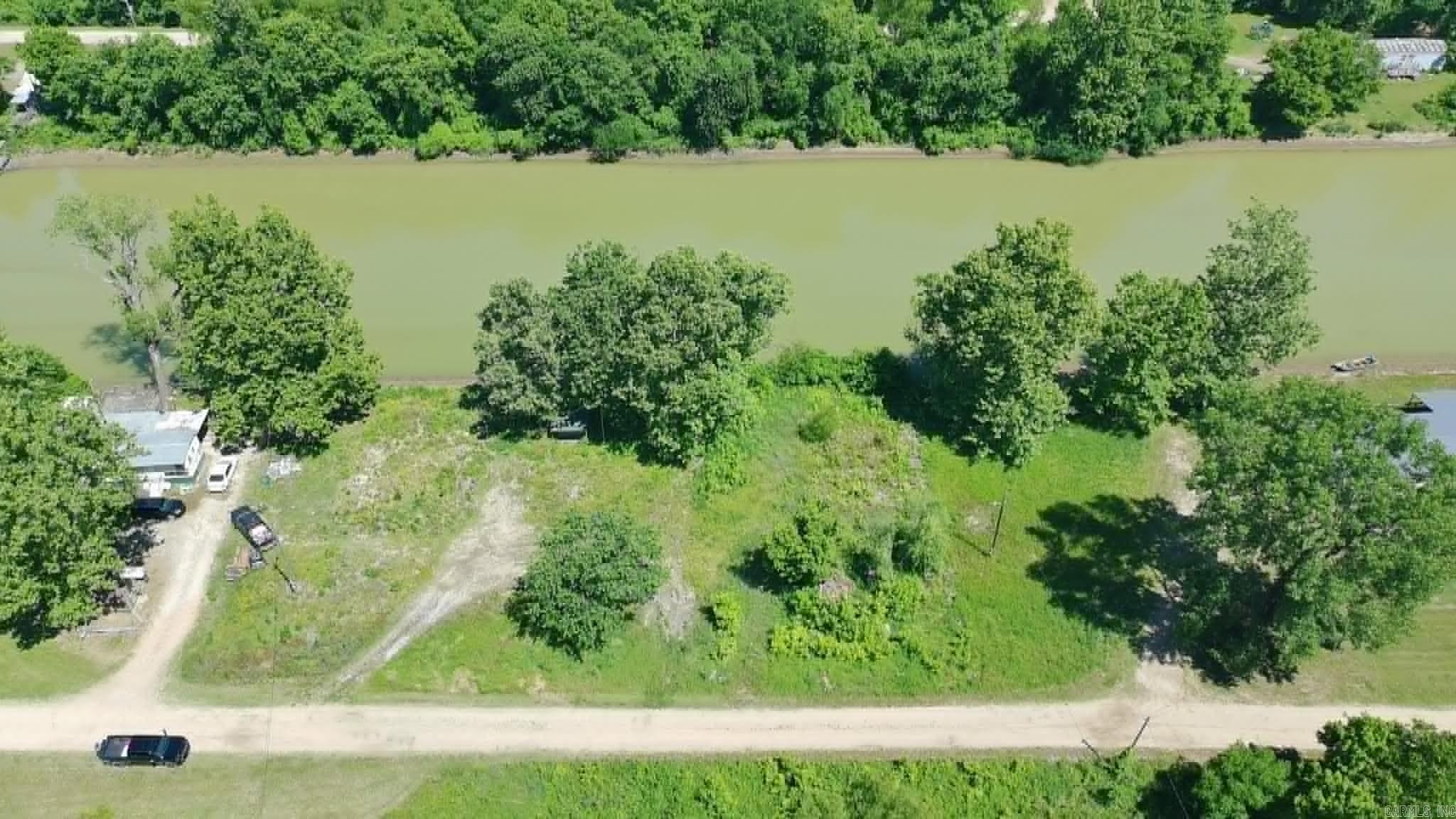 Hard-to-find 1.12± acre waterfront tract just outside Paragould with direct frontage on Big Slough Ditch—a prime setup for duck hunters, anglers, and anyone wanting a quiet place by the water. This property offers a great mix of open ground and tree cover, plus a cleared area that provides a solid starting point for access, parking, or a future homesite. Whether your vision is a full-time home, a weekend cabin, or a hunting/fishing getaway, this one checks a lot of boxes. Enjoy the convenience of being close to town while still feeling tucked away, with waterfront views and the kind of natural cover hunters look for. (Buyer to verify utilities, floodplain/building requirements) If you’ve been waiting on a small waterfront tract with multiple uses—build, hunt, fish, or simply unplug—this is a great slice of Northeast Arkansas outdoors.