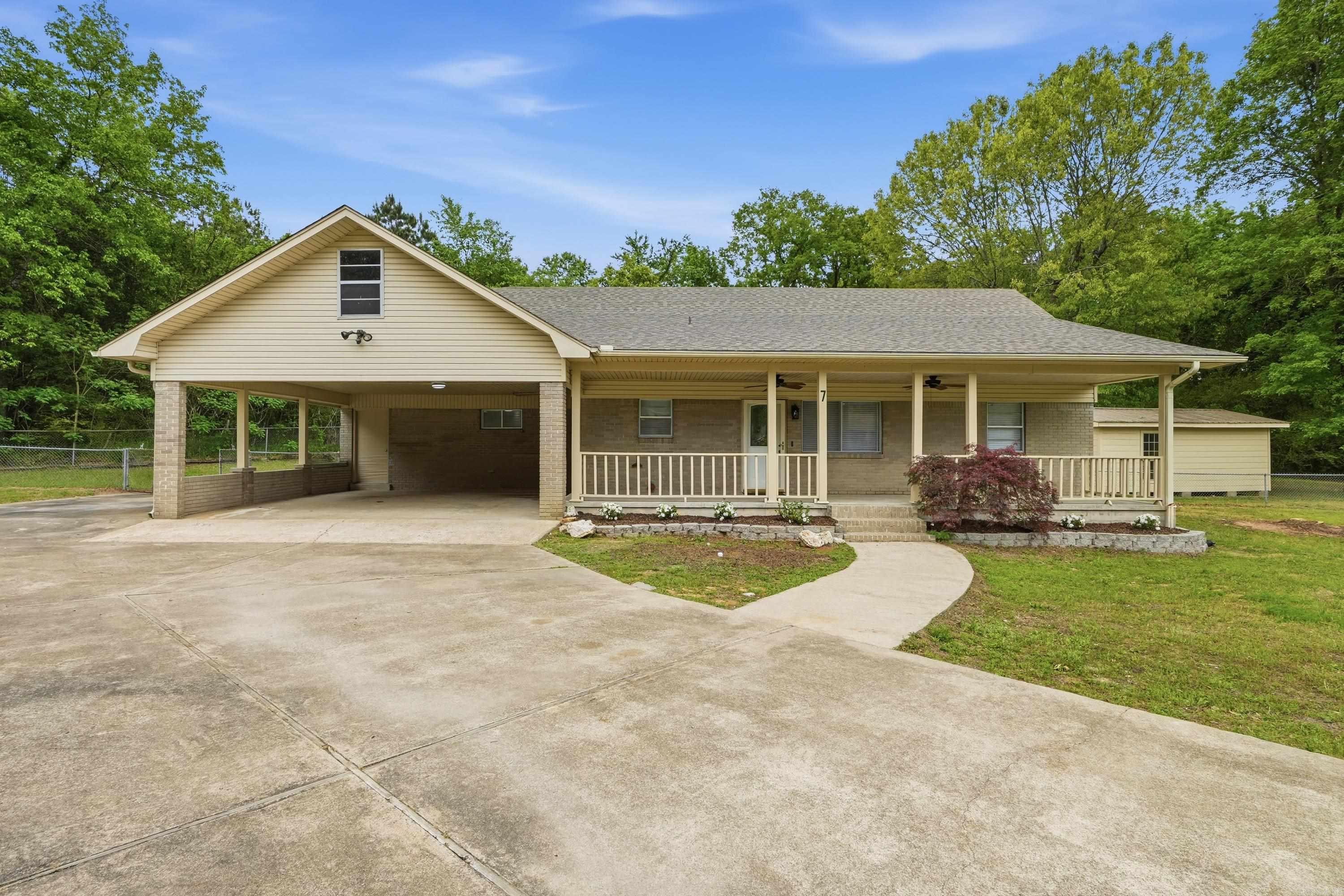 Welcome to your dream home, completely remodeled and ready for you to move in! This stunning country residence boasts a spacious 1,200 sqft shop equipped with water and electricity, perfect for any hobbyist or entrepreneur. As you step inside, you'll be captivated by the high-quality updates throughout: upgraded plumbing & electrical systems, modern flooring, fresh paint, and exquisitely remodeled bathrooms featuring custom-tiled showers. This versatile home offers three distinct living areas, including a formal living room, a generous living area with a formal dining space, and an expansive den that seamlessly transitions to a covered patio—ideal for entertaining. The layout is perfect for creating an in-law suite, providing privacy and comfort for extended family. Additionally, a smaller shop is conveniently located next to the house within the fenced yard, offering even more space for projects or storage. With a new roof and numerous major upgrades, this property promises worry-free living. Nestled at the end of a cul-de-sac on a low-traffic street, this home offers unparalleled peace and tranquility. Don’t miss your chance to experience the best of country living—call us today!