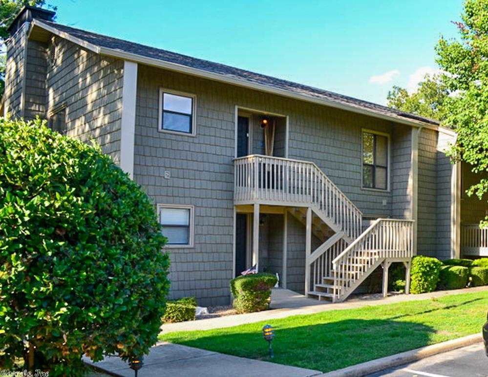 A Lazy Owner Condo - Not a thing to do but "enjoy" in this fashionable lakeside condo at the Moorings.  It's a wonderful vacation condominium in excellent condition that's been completely updated inside & out. The floor plan was even modified to offer more privacy in the bedrooms and an open, spacious feel in the family room/kitchen area.  Updates include stainless steel appliances, large wrap around bar, new flooring, lighting, new bathrooms, electric fireplace, new shake shingle vinyl siding, new roof