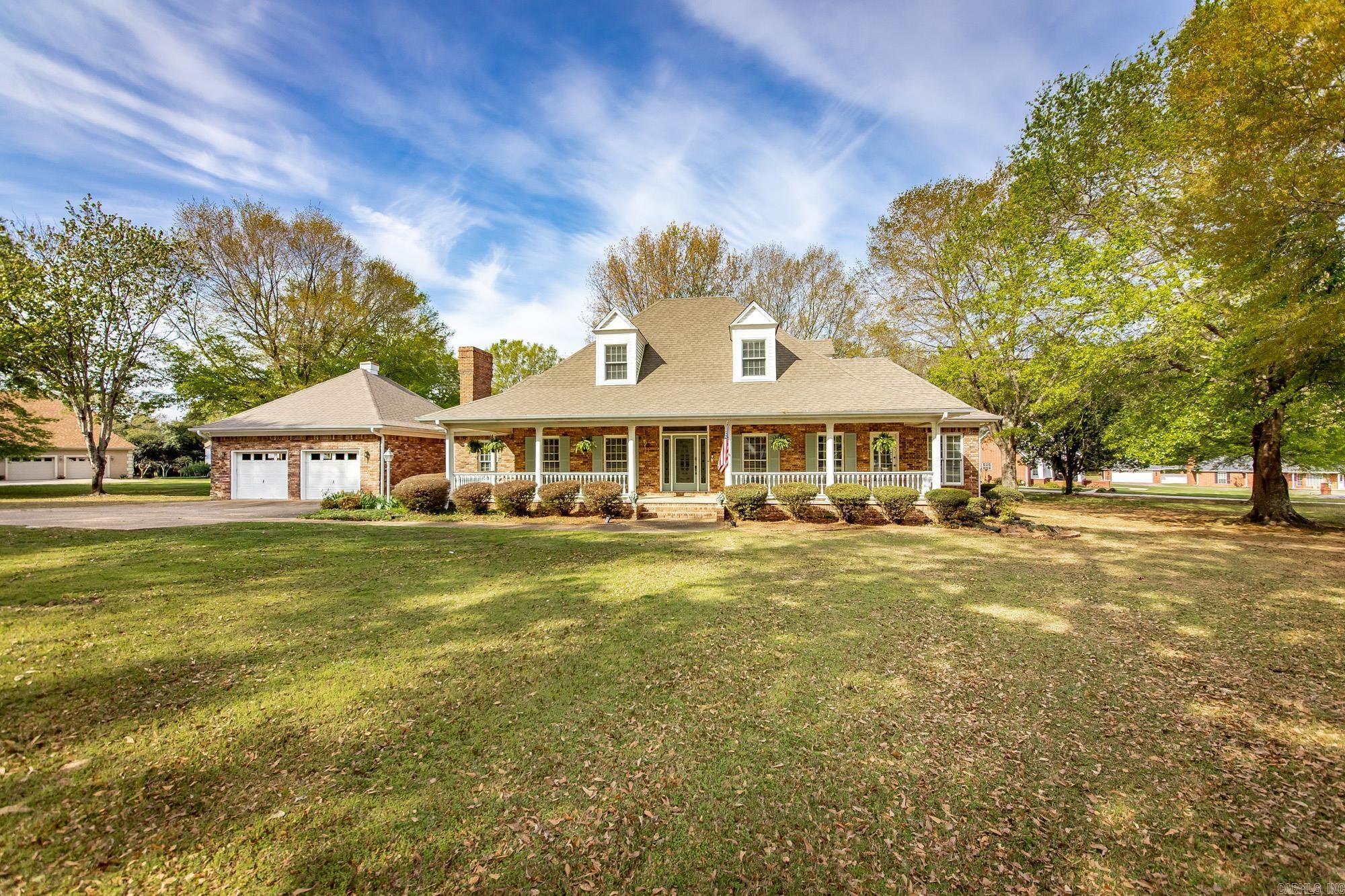 This beautiful 4-bedroom, 3.5-bath home sits on a 1.60 acre lot with a peaceful pond and mature trees. Inside, you’ll find a formal living room and a large kitchen with a bar that opens to a cozy den featuring a fireplace. The primary suite offers a relaxing sitting area, his-and-hers vanities, and a walk-in closet. A large office with abundant natural light makes working from home a dream. Upstairs, one guest bedroom has a private bath while the other two share a convenient Jack-and-Jill layout. Enjoy outdoor living on the tiered deck overlooking the expansive yard. The oversized garage provides extra space for a workshop or storage.  See Agent Remarks..