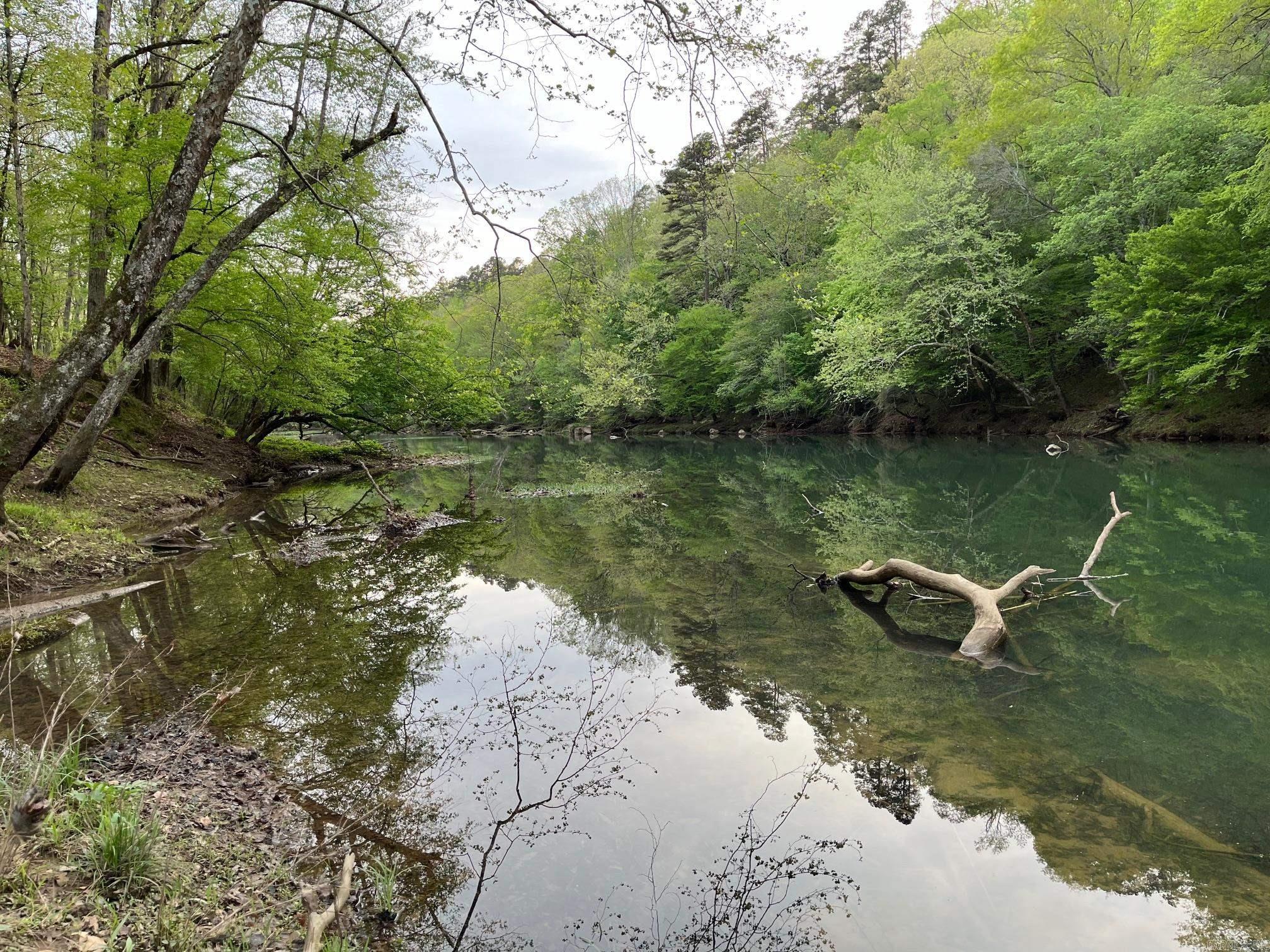 We finally have beautiful affordable river tracts with all utilities available. Every parcel has at least 200 ft. of river frontage & big hardwoods on it. This is by far the most desirable & private section on the whole river. Additional acreage also available without river frontage for $15,000 an acre. All tracts have access to rural water. The tracts range from 2-4 acres & are $155,000-$165,000 each. Lot 7 is already under contract.