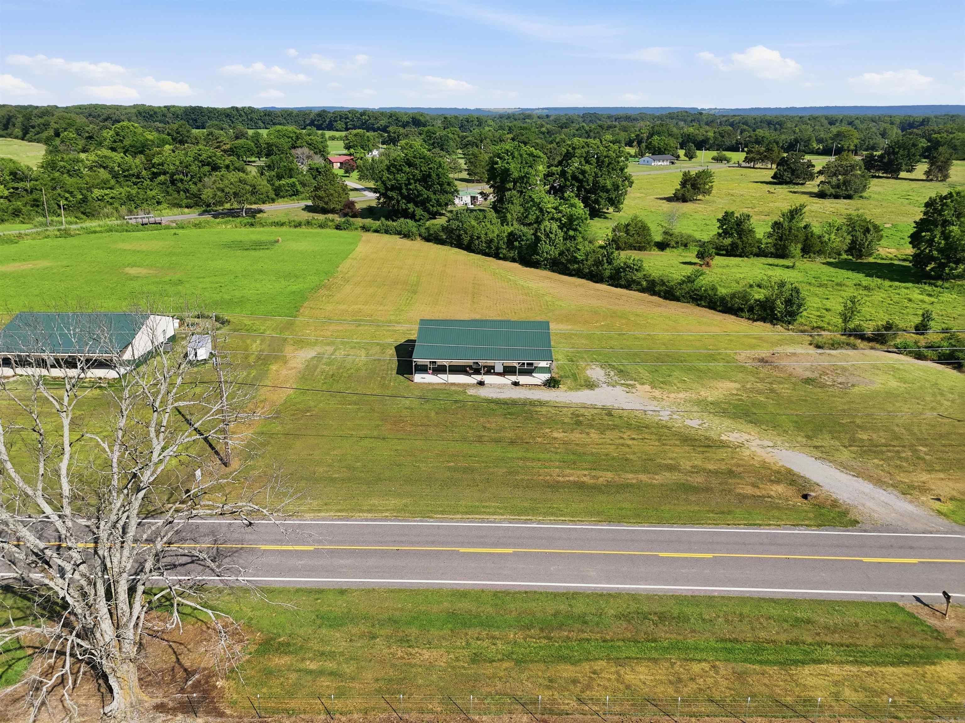 Precious Barndominium-style home on 2.41 Acres. Nice sized rooms, Well insulated, Huge living room opened up to kitchen with breakfast bar! Lots of room for animals, kids, or just you.