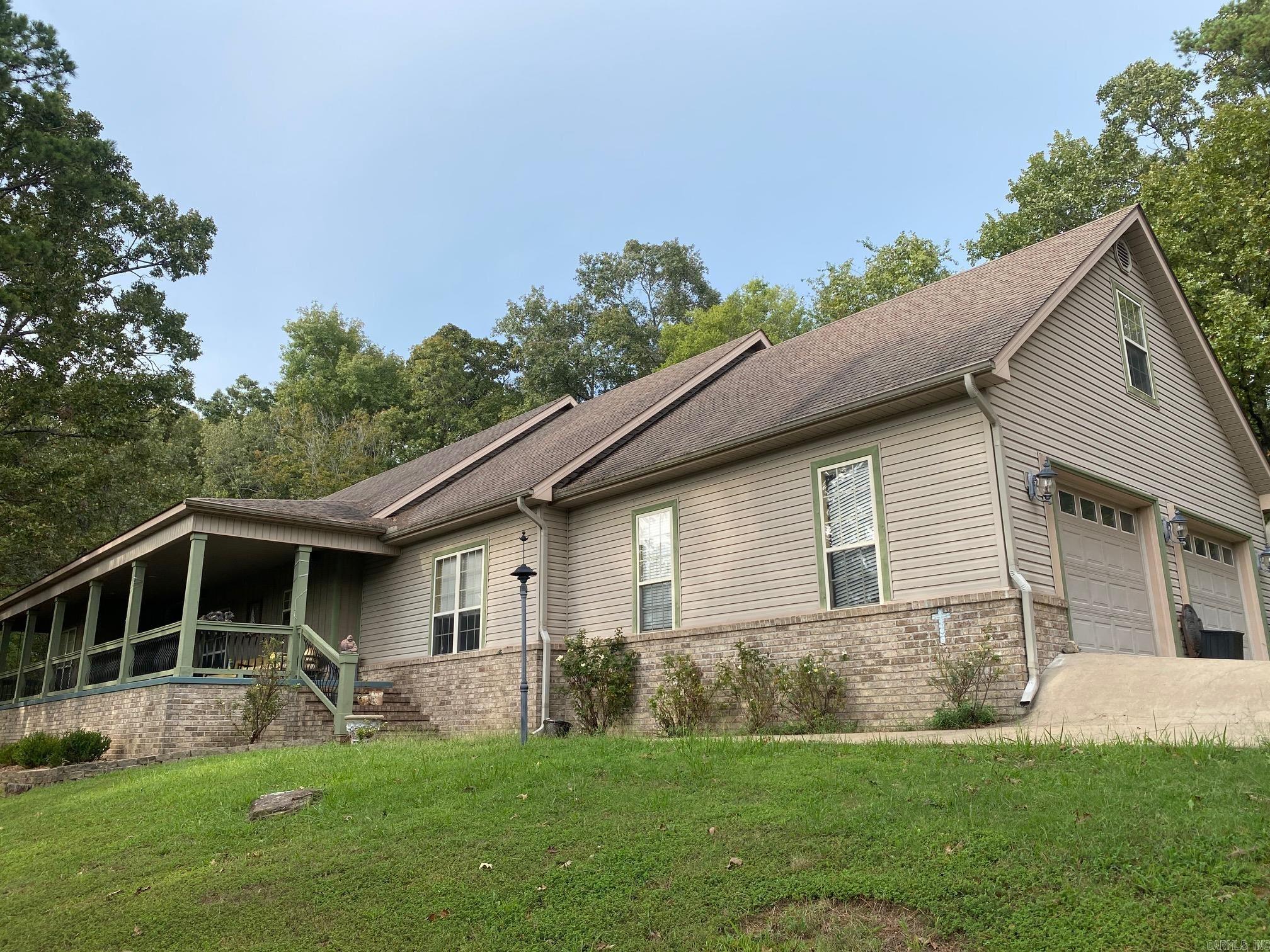 Beautiful Lakeview home located between Heber Springs and Eden Isle and just five minutes away from Heber Springs Marina. This spacious home boasts 4 bedrooms, 2 1/2 bath, large kitchen, formal living room, den with wet bar, and spacious area in fenced backyard perfect for entertaining.  Enjoy beautiful sunsets from your expansive front porch or for more privacy just step out on your deck outside the master suite to relax. This home has so much to offer, call today and see for yourself!!!