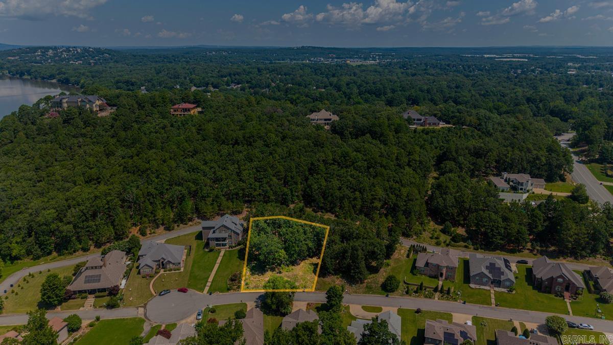 Beautiful build-ready homesite in the highly desirable Turtle Creek subdivision with spectacular Arkansas River views. HOA-approved custom home plans and survey are available, providing buyers a significant head start on construction. Utilities including public water, sewer, natural gas, and electric are available. Unique dual access from the front and rear of the lot offers additional flexibility for home design and access. Easy access to shopping, dining, parks, and the interstate. Contact listing agent for approved plans, survey, HOA information, and additional property details.