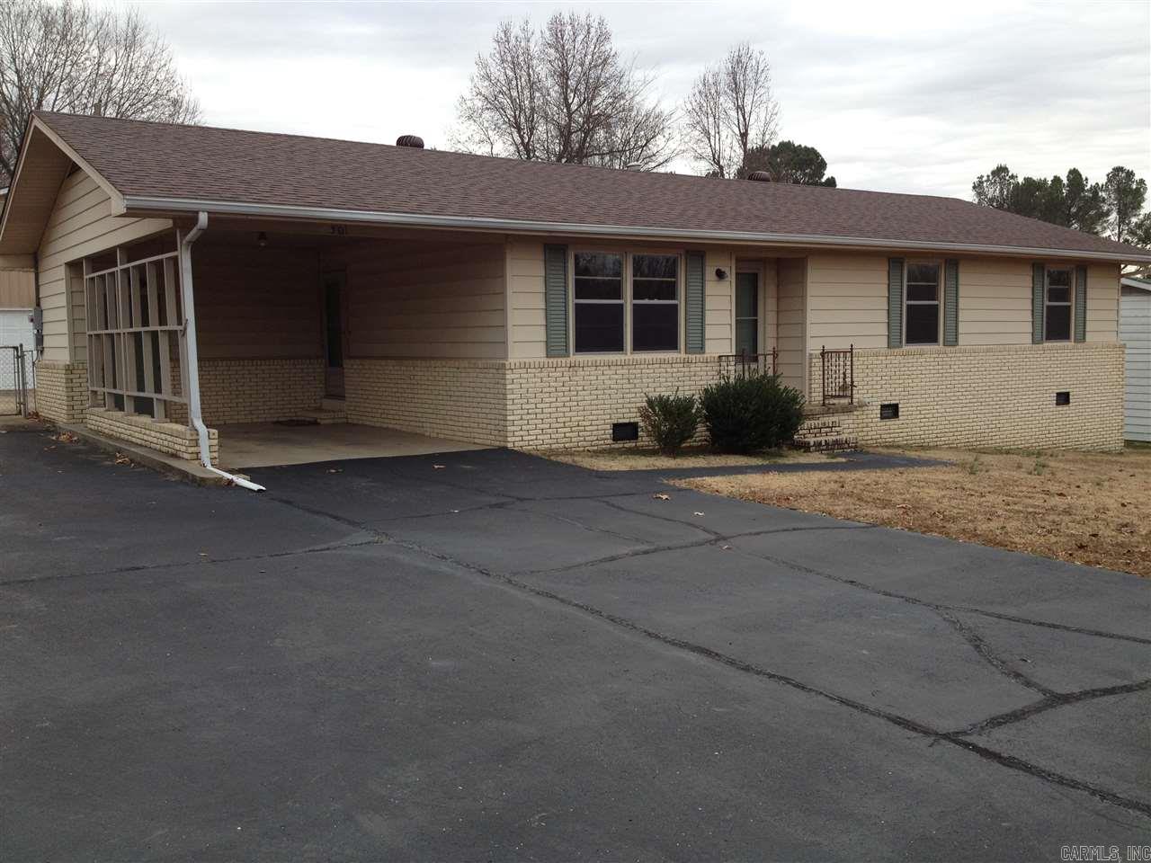 House has been recently painted. Furnished appliances include refrigerator, electric solid surface cooktop, self cleaning built in oven, dishwasher, washer and dryer. Attached carport has storage room.  Asphalt parking pad extends along the side of the house to detached garage with bonus room upstairs inside the fenced backyard. Covered patio in the back. No pets allowed. Not HUD Section 8 rental. Application required. Application fee charged. Contact Property Manager.