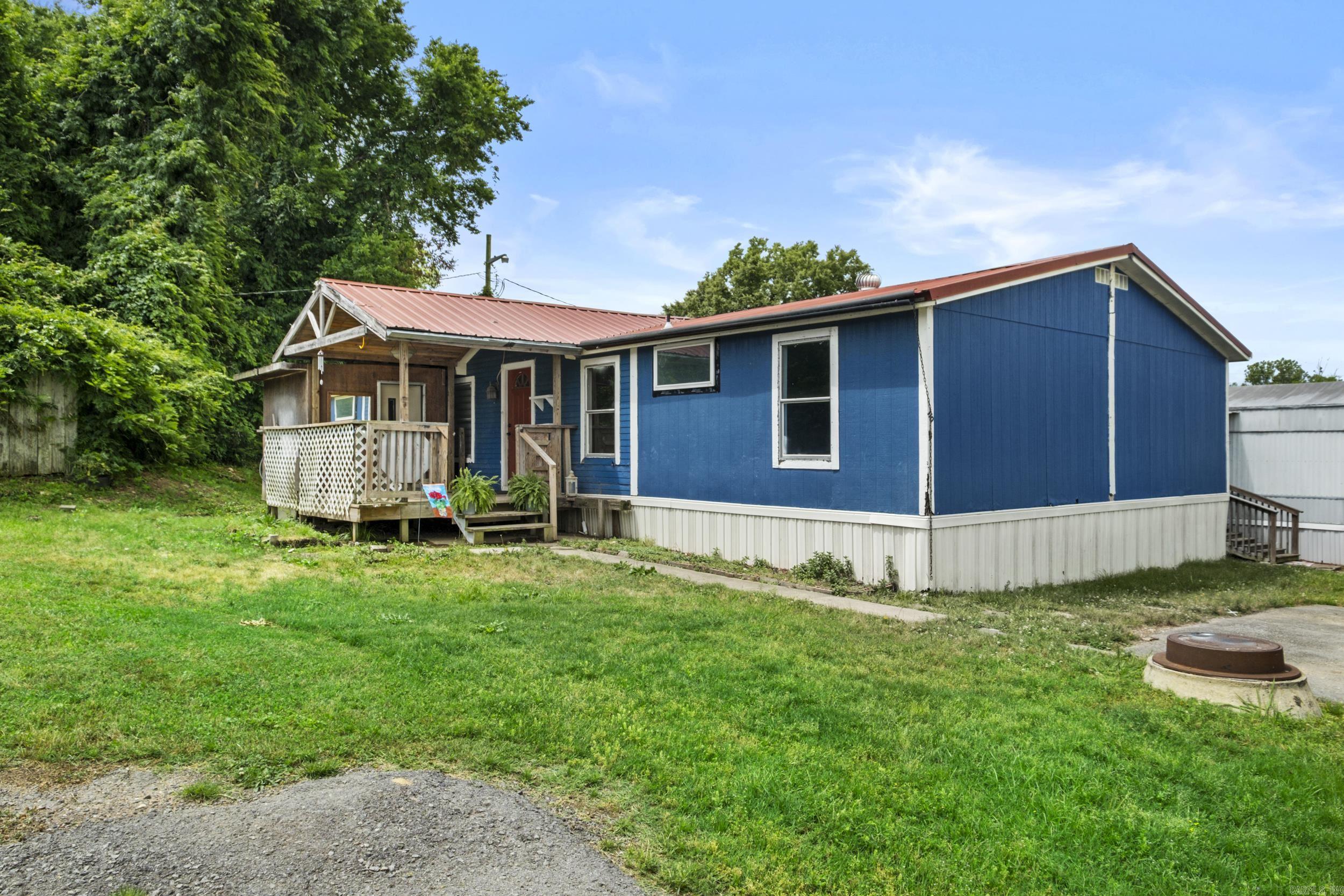 Welcome home to this spacious double wide mobile home situated in the quiet neighborhood of Hurricane Lake Mobile Home Park. This property has 4 bedrooms and 2 baths with an open living space floor plan. New luxury vinyl flooring throughout and beautiful new tile backsplash has been added to the kitchen. The refrigerator and the few pieces of furniture remaining will convey if buyer wishes to keep. A generous size outside storage closet is also included. There is a combined monthly fee for the lot space and trash pick-up. Schedule with Showing Time. (Agents see remarks)