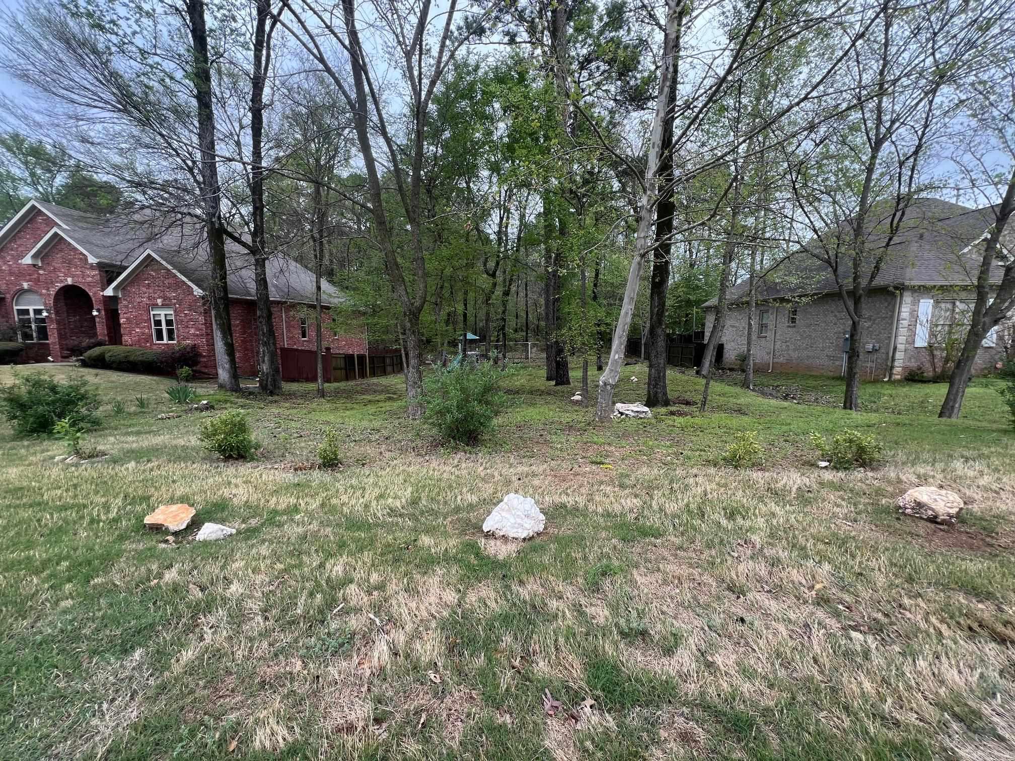 Build Your Dream Home in Prestigious Hurricane Lake Estates! Welcome to one of Saline County’s most sought-after gated communities, where luxury living meets everyday convenience. This lot offers the perfect opportunity to create a custom home tailored to your lifestyle. Residents of Hurricane Lake Estates enjoy access to a wide range of amenities, including a sparkling community pool, clubhouse, tennis courts, and private lake access for boating, fishing, or simply relaxing by the water. With well-maintained streets, upscale homes, and a strong sense of community, this is more than just a place to live—it's a place to thrive. Conveniently located near top-rated schools, shopping, dining, and easy access to Little Rock. Don't miss this rare opportunity to own a piece of paradise in Hurricane Lake Estates!