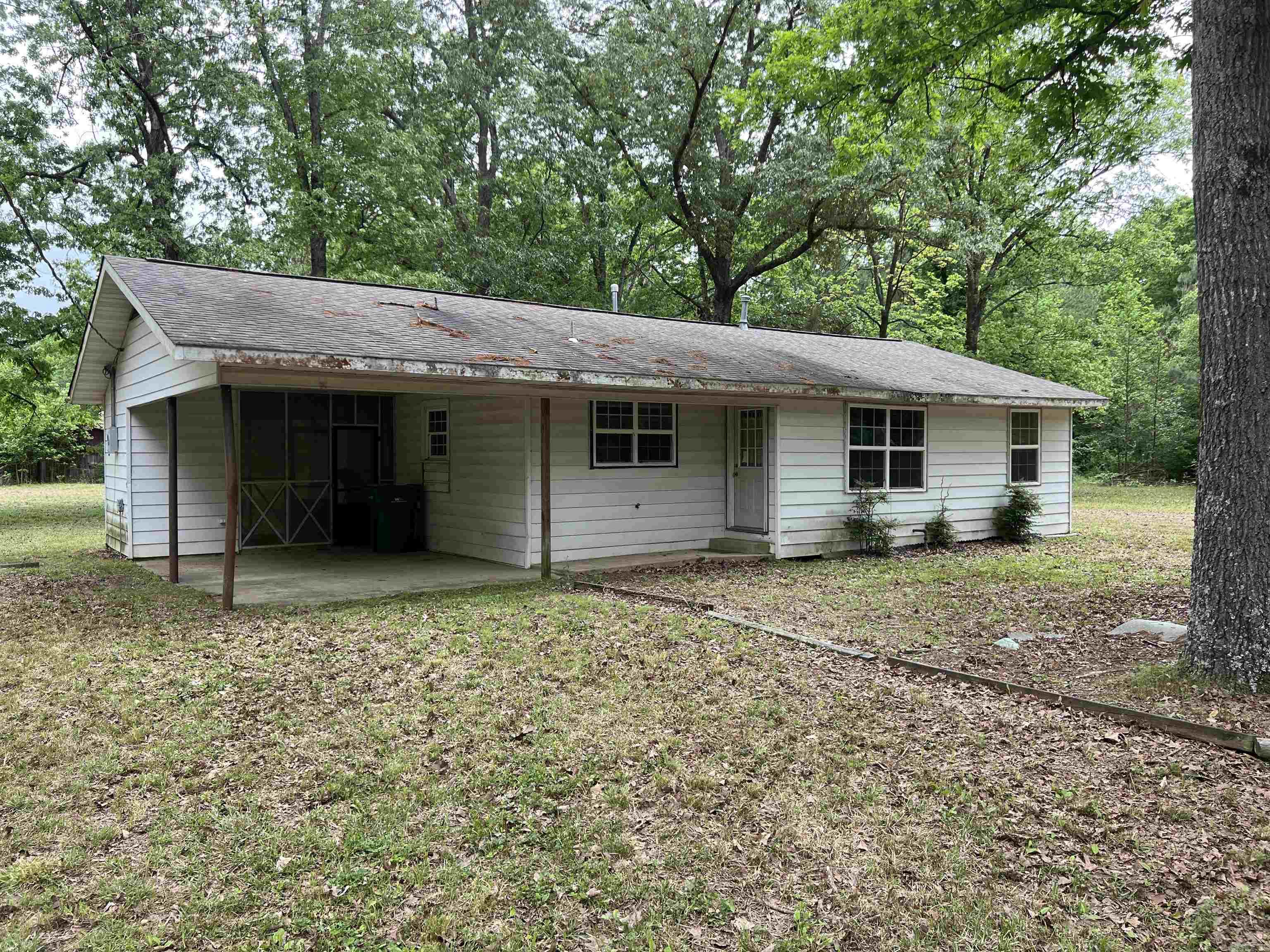 Check out this two bed on bath home on 7.3 acres.  If you're looking for quiet county living but yet close to the amenities that Pine Bluff has to over this is the perfect choice for you.  This home has spacious bedrooms, large laundry room, hardwood floors and plenty of storage. Property being sold as is.