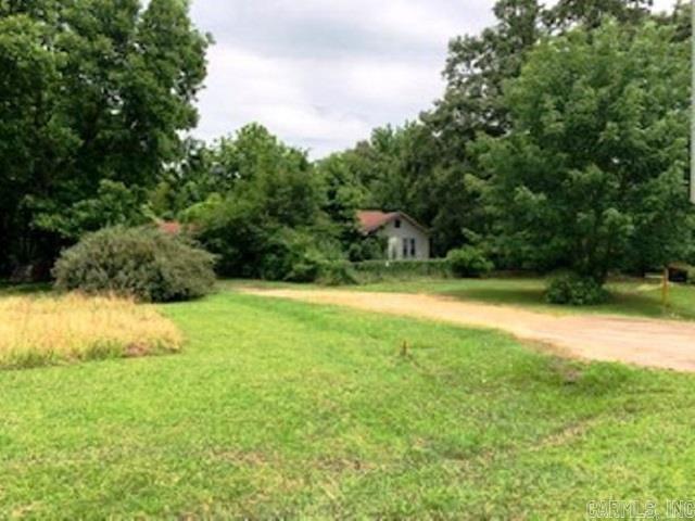 LOCATION IS EVERYTHING. 1.52-acre commercial lot on US 79, at prime, high-traffic intersection in Camden, Arkansas; 1 mile from US Hwy 278 & US Hwy 79 bypass. High school is 1/2 mile away; other schools within 3 miles; hospital/police within 2 miles. 25 minutes from Camden Industrial Park; 30-40 minutes from lithium projects. All mineral rights convey. Square footage, lot size, and acreage is taken from courthouse records.