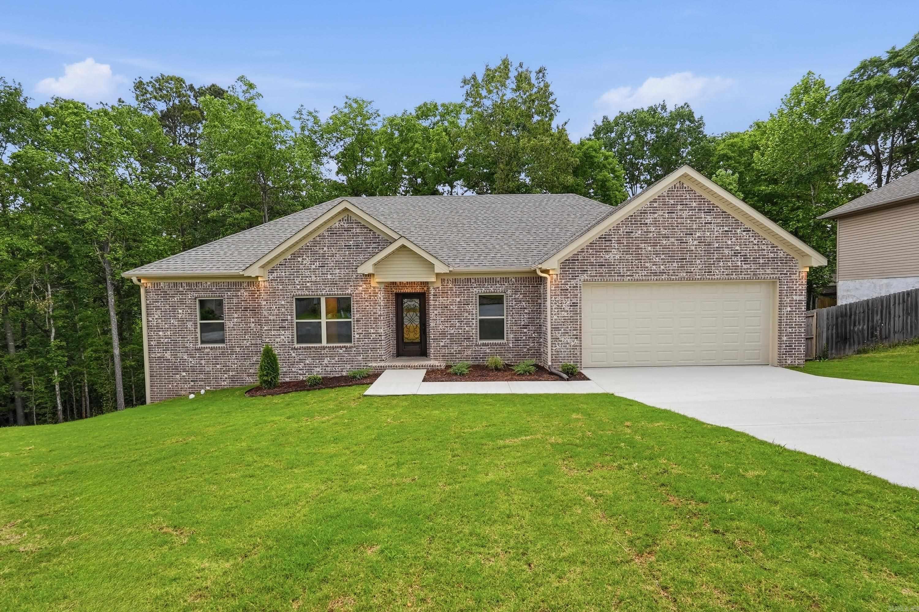 Situated in a private cul-de-sac within the Benton School District, this beautiful new construction custom home offers both comfort and style. Featuring 4 bedrooms and two baths, the home includes a bonus room and an open concept plan with a primary suite split from other bedrooms. Enjoy 9' ceilings, luxury vinyl flooring throughout, custom cabinets, beautiful counter tops, spacious closets, and a dedicated laundry room. The generously sized primary suite flows into the ensuite bathroom, complete with dual sinks, a shower with dual shower heads and a large walk-in closet. A sizable crawl space provides abundant additional storage, adding even more functionality to the thoughtfully designed home. This home is a must see! **don't miss the newly updated deck!! Agents schedule via BrokerBay