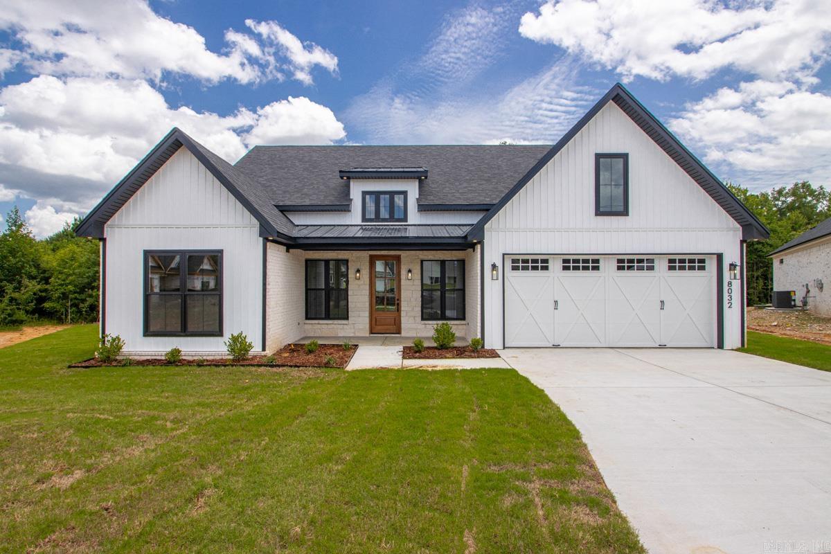 Beautiful new construction custom home tucked away on a quiet cul-de-sac in Bryant, with easy access to Little Rock for commuting. Loaded with upgrades you won't find in typical new builds. The kitchen is a showstopper: upgraded quartz countertops, stain-grade island, 30" gas cooktop with vent hood, wall oven, pocket office, and toe-kick lighting. The primary suite features a frameless walk-in shower, statement fixture over the soaking tub, and matching toe-kick lighting in the bath. Additional upgrades include Anderson black-on-black windows, natural cut stone accents on the porch and fireplace, foam insulation, a tankless water heater, floor outlet in the living room, and a carriage-style garage door with windows. The FEMA-rated tornado shelter has been repurposed as a laundry room with stackable washer/dryer included, and the home is prewired for security cameras.Outside, a large covered patio with a high-powered oscillating fan overlooks a private backyard — perfect for entertaining year-round. A rare combination of quality construction, high-end finishes, and thoughtful design. Don't miss this one!