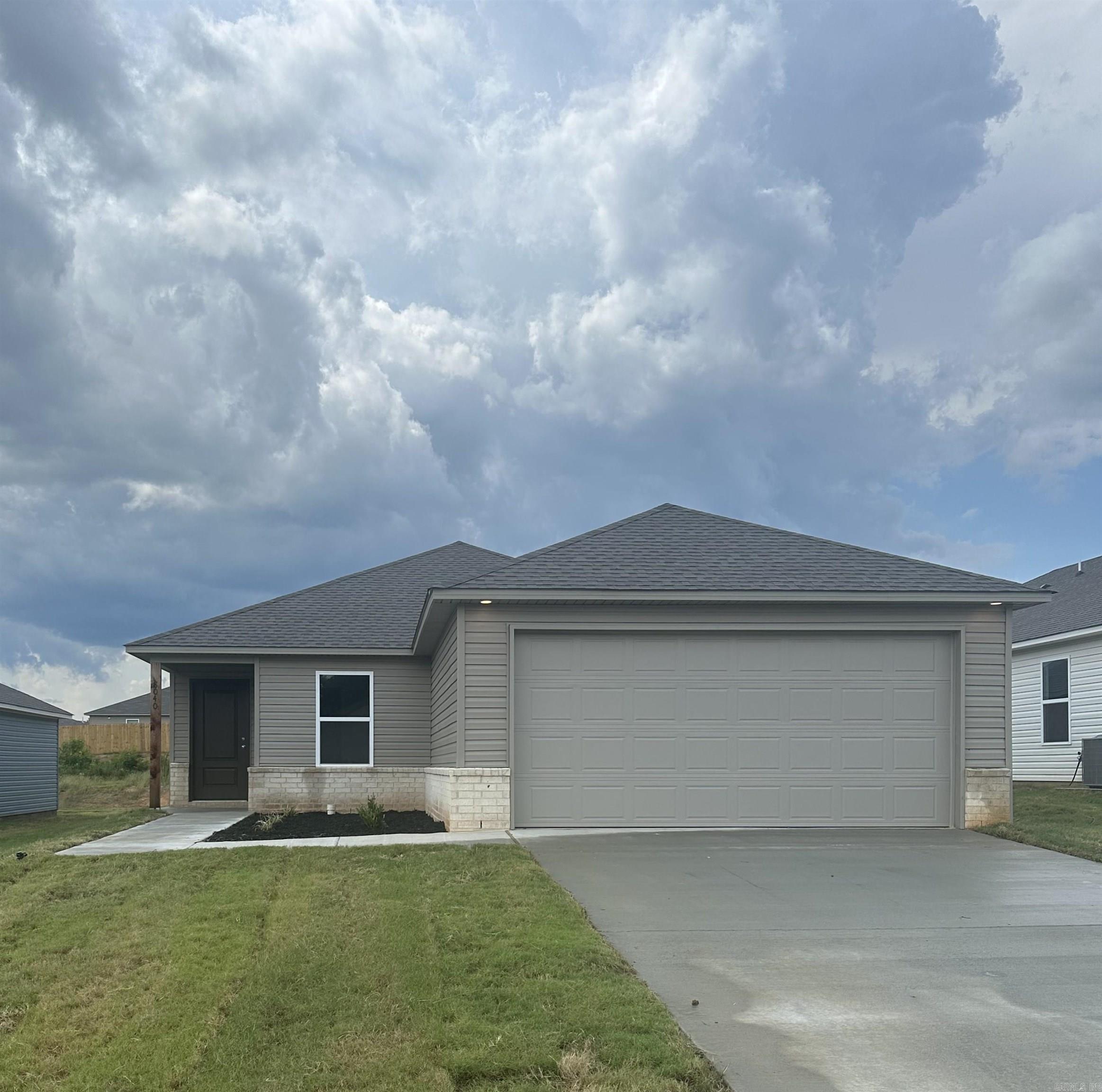 The beautiful Bridgeport plan has a  welcoming covered entryway and front yard landscaping. This one-story home features 4 bedrooms and 2 bathrooms. Enjoy the large open-concept living room, fully equipped kitchen with energy-efficient appliances, ample counterspace, and corner pantry. The laundry room, conveniently located just off the garage, is perfect for any sized family. Learn more about this home today!   **SEE SHOWING REMARKS & AGENT REMARKS FOR IMPORTANT INFORMATION**