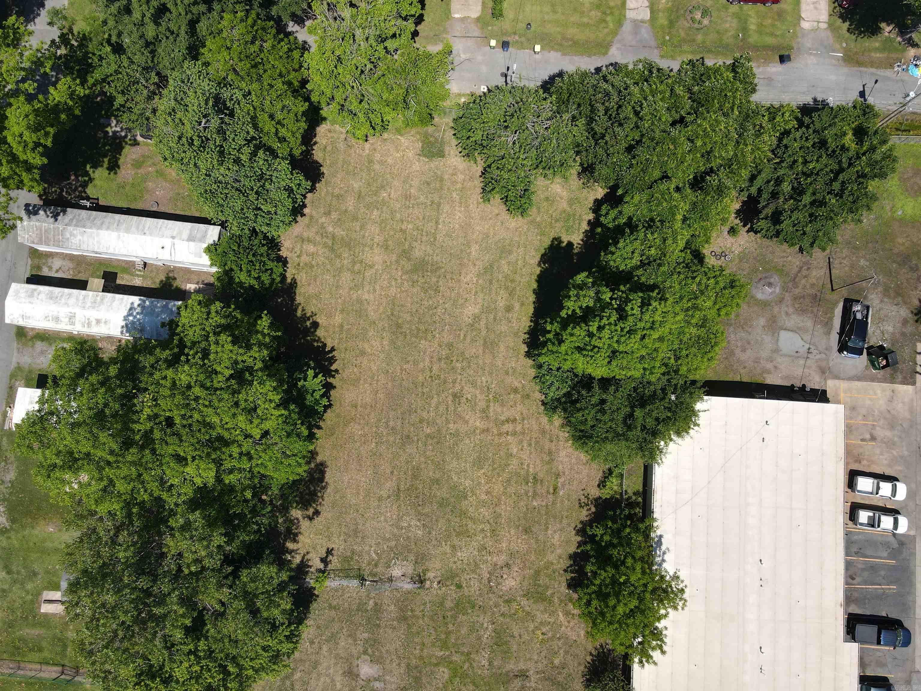 High-visibility commercial lot in a prime E Broadway location! Excellent development potential with utilities available at/near road. Seller states a home previously occupied the property and utilities may have existed previously; buyer to verify all information. Great opportunity for investment or future business development!