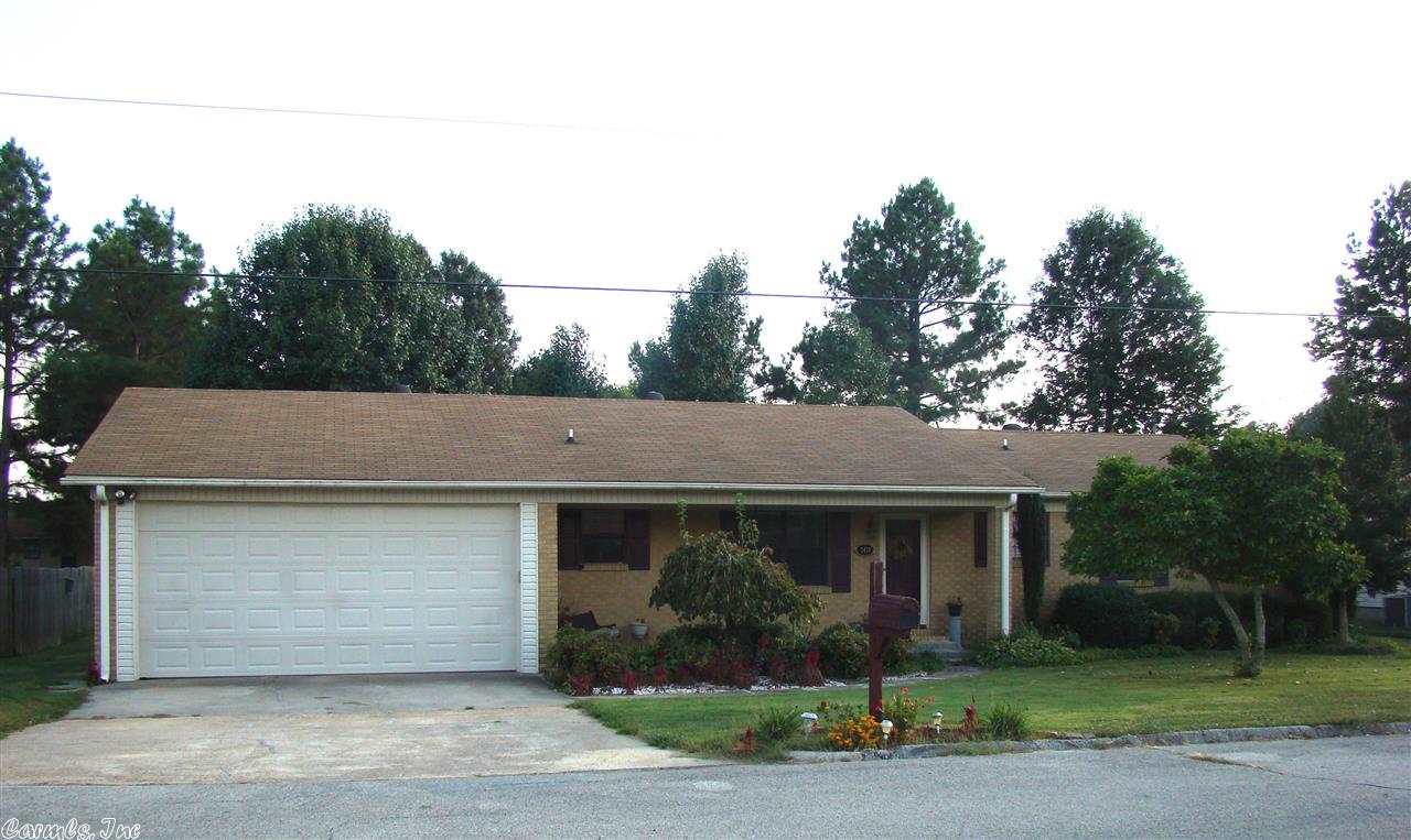 Great 4 bedroom 2 bath home  sitting on a well landscaped lot. Gas fireplace, large dining area  French doors led to a nice deck, storage building. A must see!!