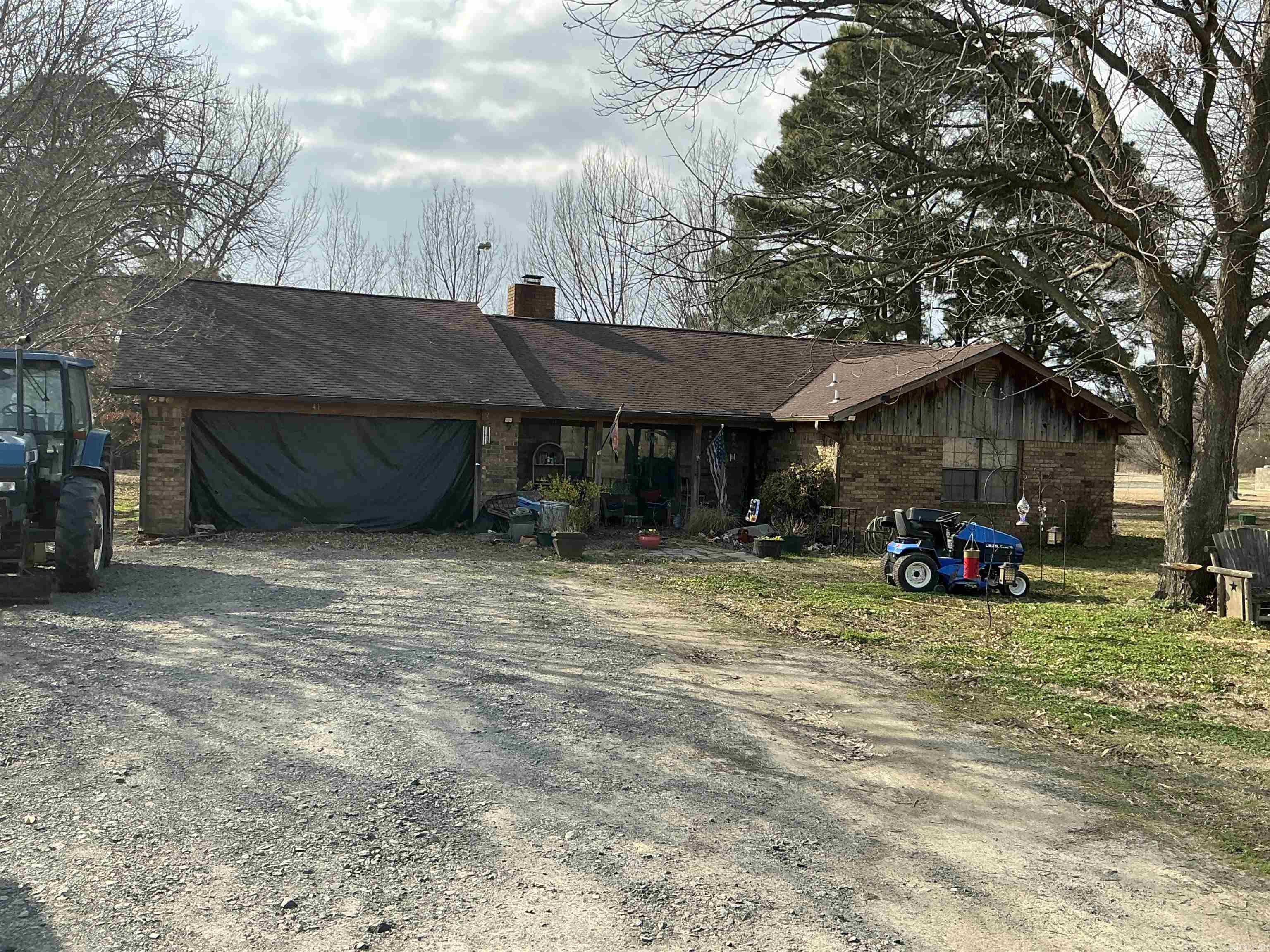 Rural location, paved road, mile to the city limits.  Some furnishings available to remain with purchase.  Garage is framed for door with no overhead door installed. Seller concession available for buyer assistance.
