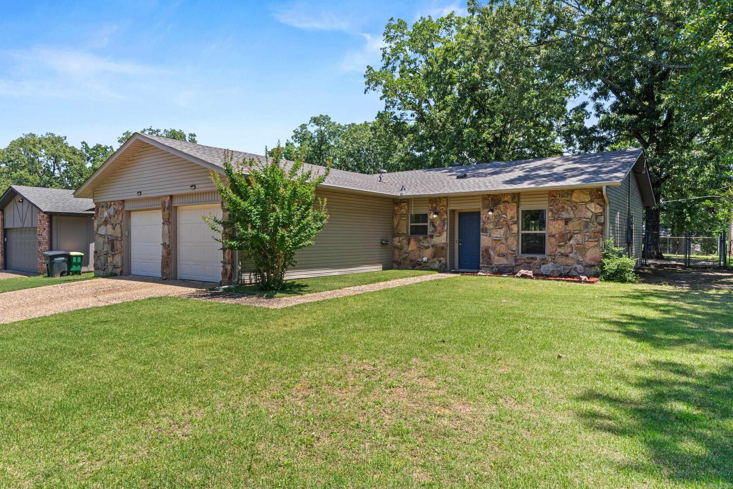 Welcome to this well-maintained home tucked away on a quiet street with limited traffic. This property features fresh paint in the kitchen, a new dishwasher, a new electric stove, and a new roof installed in June 2025. The living room features a gas fireplace, creating a comfortable gathering space year-round. Outside, you’ll find a large backyard, a storage shed, and a deck already in place and ready for an above-ground pool! Whether you’re searching for your next home or an investment opportunity, this home offers practical updates, functional space, and plenty of potential! Agents see remarks. *fire in the fireplace is AI generated*