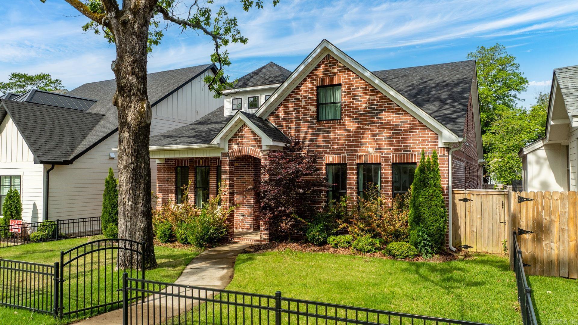 Fabulous newer Heights home with a wonderful floor plan just steps away from Forest Park Elementary! On the main level, this home features a nice living room with fireplace open to dining room, a chef's kitchen (featuring quartz countertops, large waterfall island, top-of-the-line appliances, an ice-maker and walk-in pantry) open to second living area/den with fireplace and built-ins, two additional bedrooms and a full bathroom. The main level also offers a luxurious primary suite with a spa-inspired bathroom, two separate large walk-in closets and laundry hookups/closet. Upstairs, there is a large bonus space/third living area that is perfect for a media room or a playroom, two bedrooms, full bathroom, a second laundry room with sink, additional storage closet and great attic space! Other features include covered screened-in back porch, designer finishes, rear-loading two-car garage and completely fenced front and back yards. Walk to Heights shopping, restaurants and more!  Check out the video here: www.youtube.com/watch?v=4wElxxyH5Ng