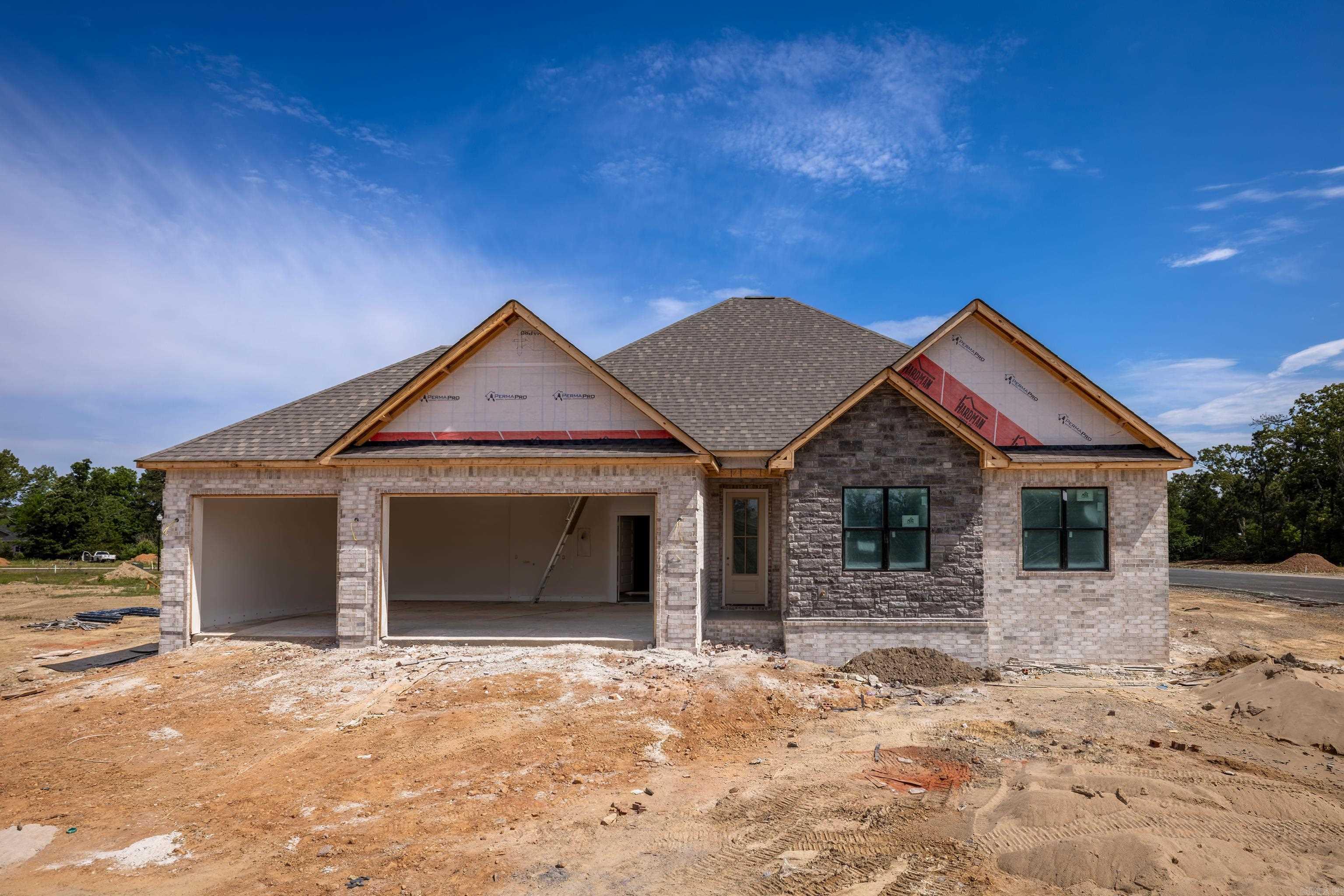 UNDER CONSTRUCTION – Experience the ultimate in energy efficiency and style with this stunning 1,733 sq. ft. all-brick home in the highly sought-after Lake Hamilton School District. Located in the scenic Walkway Point subdivision, this brand-new residence is designed for long-term comfort and savings, featuring energy-efficient appliances, a 95% high-efficiency furnace, and a tankless gas water heater for endless hot water. The spacious single-story layout offers three bedrooms and 2.5 baths, including a luxurious master suite with its own private coffee bar. The open-concept heart of the home boasts an eat-in kitchen with a center island and walk-in pantry that flows perfectly into the family room. With ten-foot ceilings, a three-car garage, and high-end finishes like granite countertops and durable laminate flooring, this home blends timeless traditional charm with modern performance. Situated on a level lot just minutes from Lake Hamilton, this is a premier opportunity to own a high-performance new build in a top-tier location.