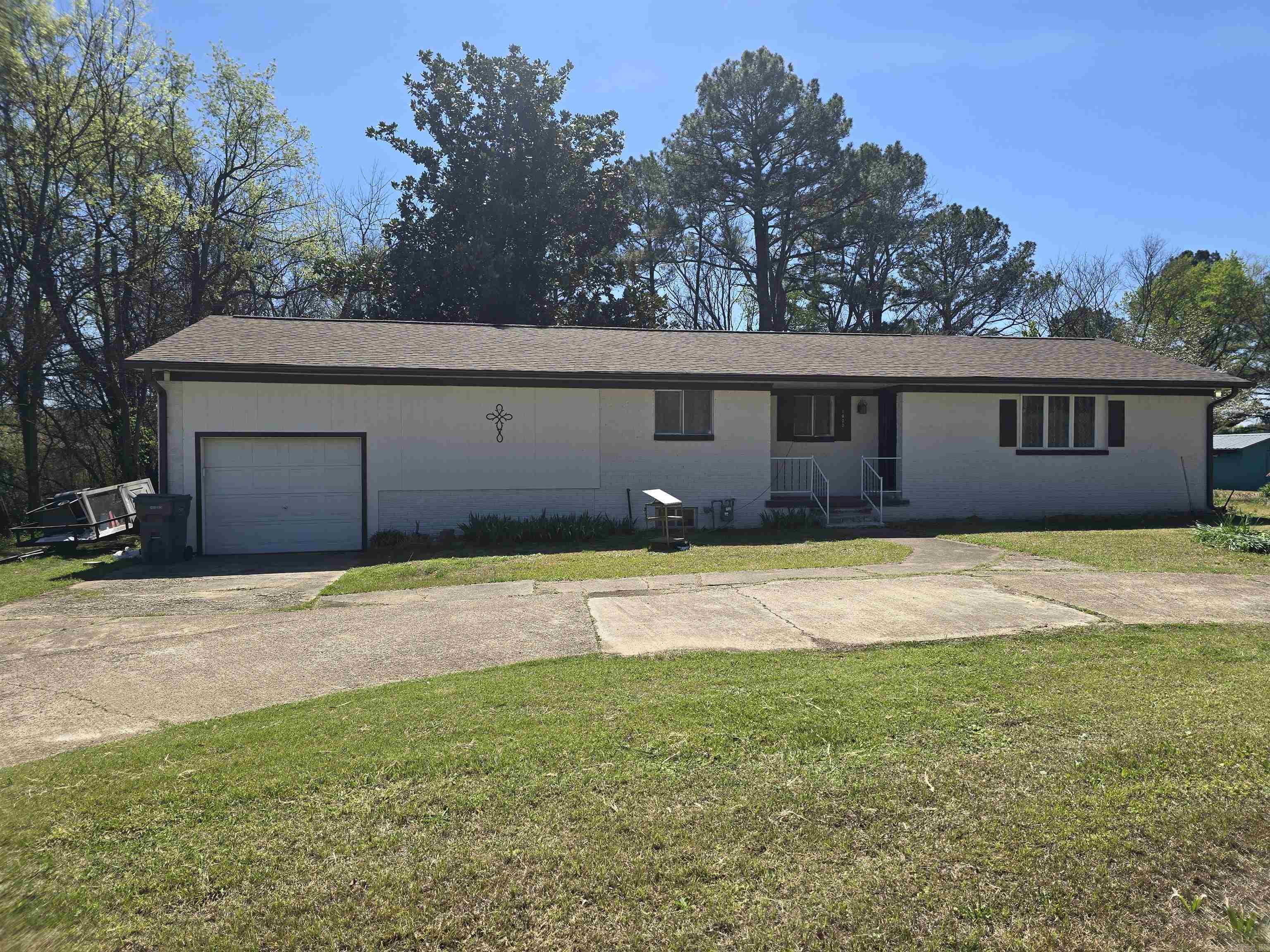 2025 remodeled 4 bedroom/2 bathroom house located only 2 miles from Lyon College in Batesville, Arkansas! This charming home has plenty of space for a large family and boasts appx 2,400 sq ft which includes an almost 500 sq ft heated and cooled but unfinished basement! Attached to the house is a single car garage with doors on both sides making driving through to the back yard easy! Updates on the house include new LVP flooring throughout with the exception of the HUGE den which has new carpet! Both bathrooms have been remodeled almost entirely preserving only the vintage tub in the main bathroom. More renovations include a new architectural shingled roof, new exterior paint, new mini split in den, new central air conditioning, new countertops, refurbished wood cabinets, new appliances, new lights, new ceiling fans, some new windows, some updated electrical and plumbing, new french doors off of the den, and much more! The 4th bedroom could be an office or a bedroom! This large family home in the heart of Batesville is sure to check off all of your wants and needs. Don't wait to see it!