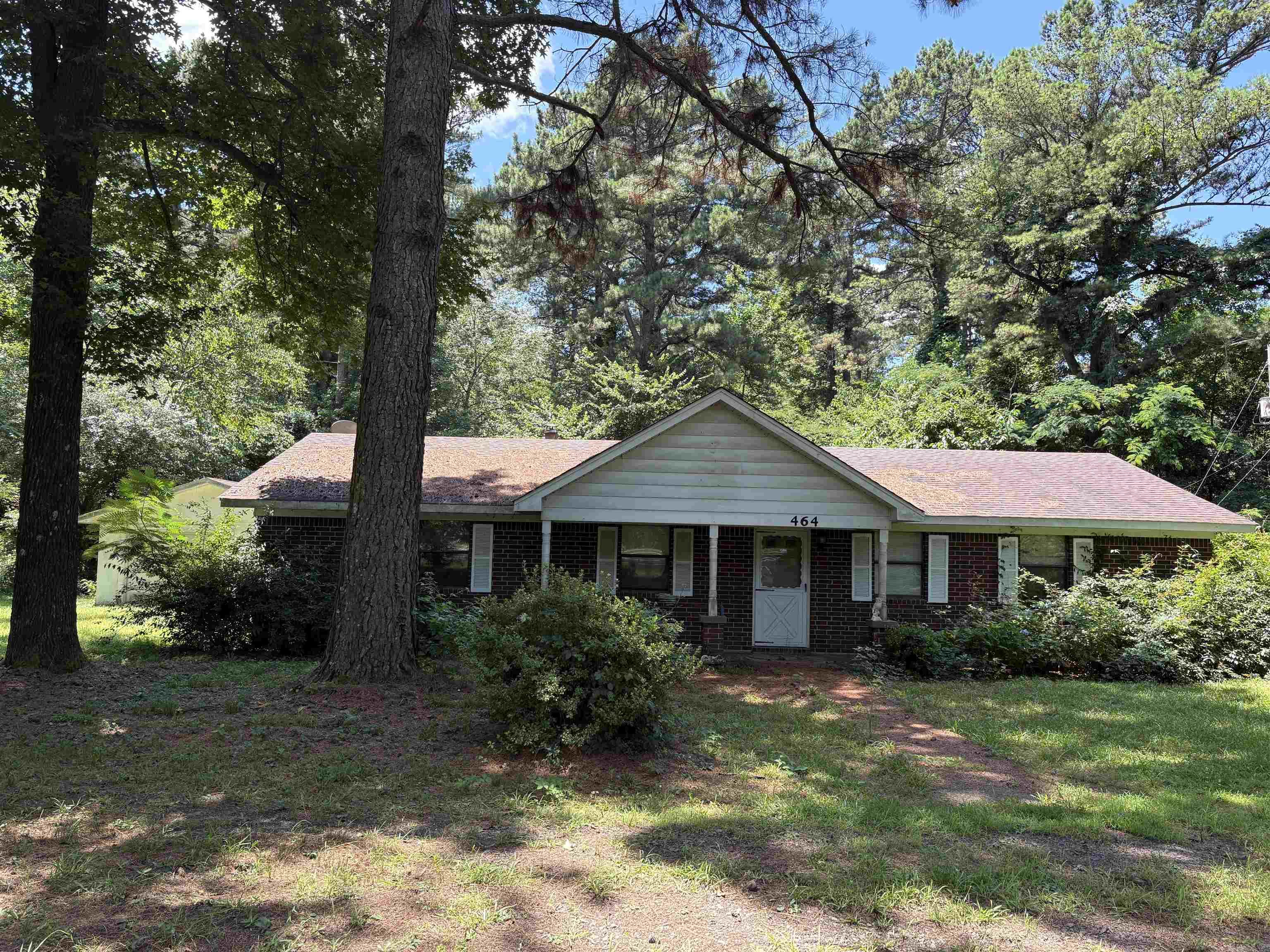 Ranch style home with gorgeous setting, but needs work! Over 26 wooded acres for personal playground. Just East of Conway.