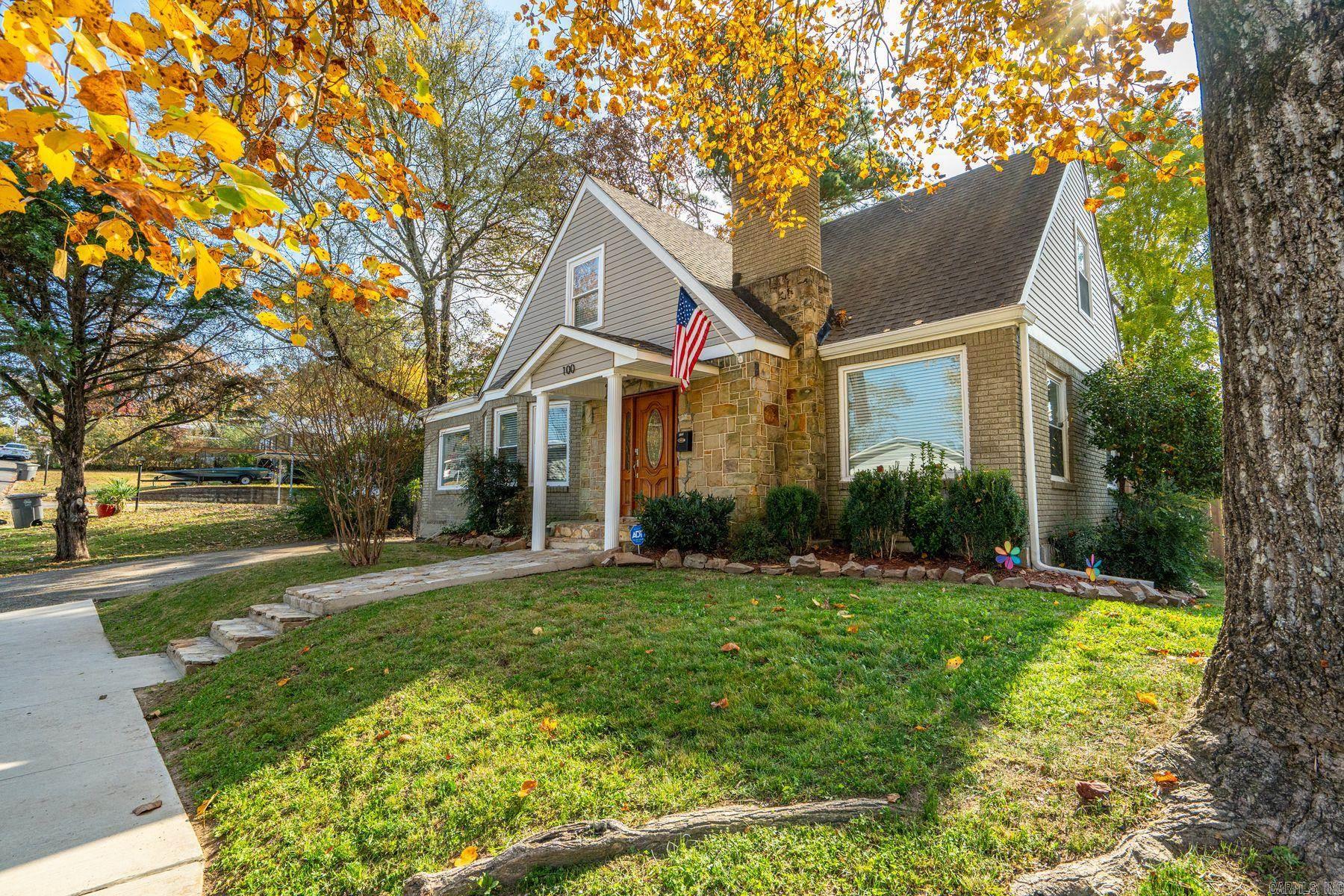 Welcome to 100 Forest Park Place, a beautifully maintained 1939 home that has been thoughtfully remodeled in 2010 and again in 2023. Offering 3,188 square feet, five bedrooms, and three baths, this residence combines timeless character with modern updates. The main kitchen features granite countertops, a gas stove, and fresh finishes, while the downstairs has been upgraded into a complete mother-in-law suite or rental space with a brand-new kitchen, bedroom, bath, and shop. Two fireplaces, one on the main level and one downstairs, add warmth and charm throughout. The split bedroom floor plan provides flexibility, with one bedroom on the main floor, three upstairs, and one downstairs. A breakfast area complements the full-sized dining space, and an additional room can serve as a formal dining room, office, or playroom. The oversized laundry room doubles as extra pantry storage, ensuring convenience. Outside, a new backyard fence creates a safe and spacious area for children, pets, or entertaining, with plenty of room for additional parking. Situated on a corner lot at the end of a quiet street with no through traffic, this home offers privacy and comfort in a welcoming neighborhood.