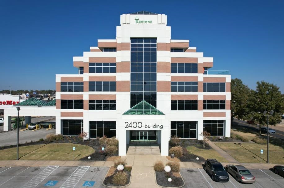 The 2400 Building is located at 2400 East Highland Drive in Jonesboro, AR. This office building is 100% occupied with ample parking. It’s located on one of the major arterials in Jonesboro with quick access to I-555.  The building is 55,639 square feet on 3.35 acres. It’s located in the middle of town, surrounded by many national retailers and restaurants like Walmart, Lowe’s, Texas Roadhouse, Freddy’s Frozen ustard & Steakburgers, and Kroger to name a few. The office building is also just seconds from Red Wolf Boulevard - Jonesboro’s main retail/ restaurant artery.