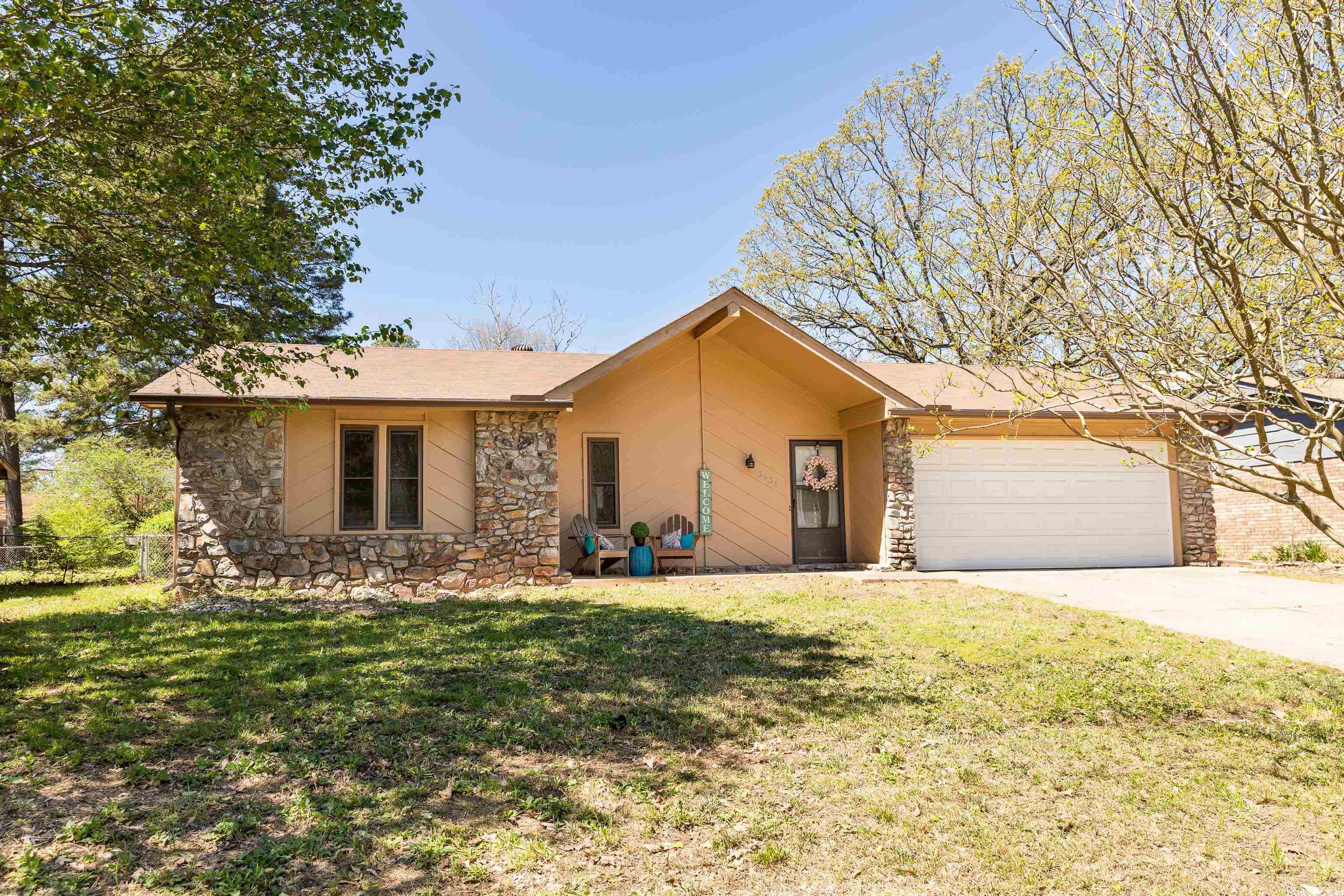 Don't miss your chance to get into this beautiful home in Bryant's Springhill Manor, located close to popular restaurants, entertainment and shopping!   This 3 bed 2 bath home features loads of recent upgrades, including LVP flooring (2020), Roof (2021), Gutter Guards (2021), Kitchen Appliances (2021), Exterior and Interior Paint (2021) and both baths remodeled 2021!