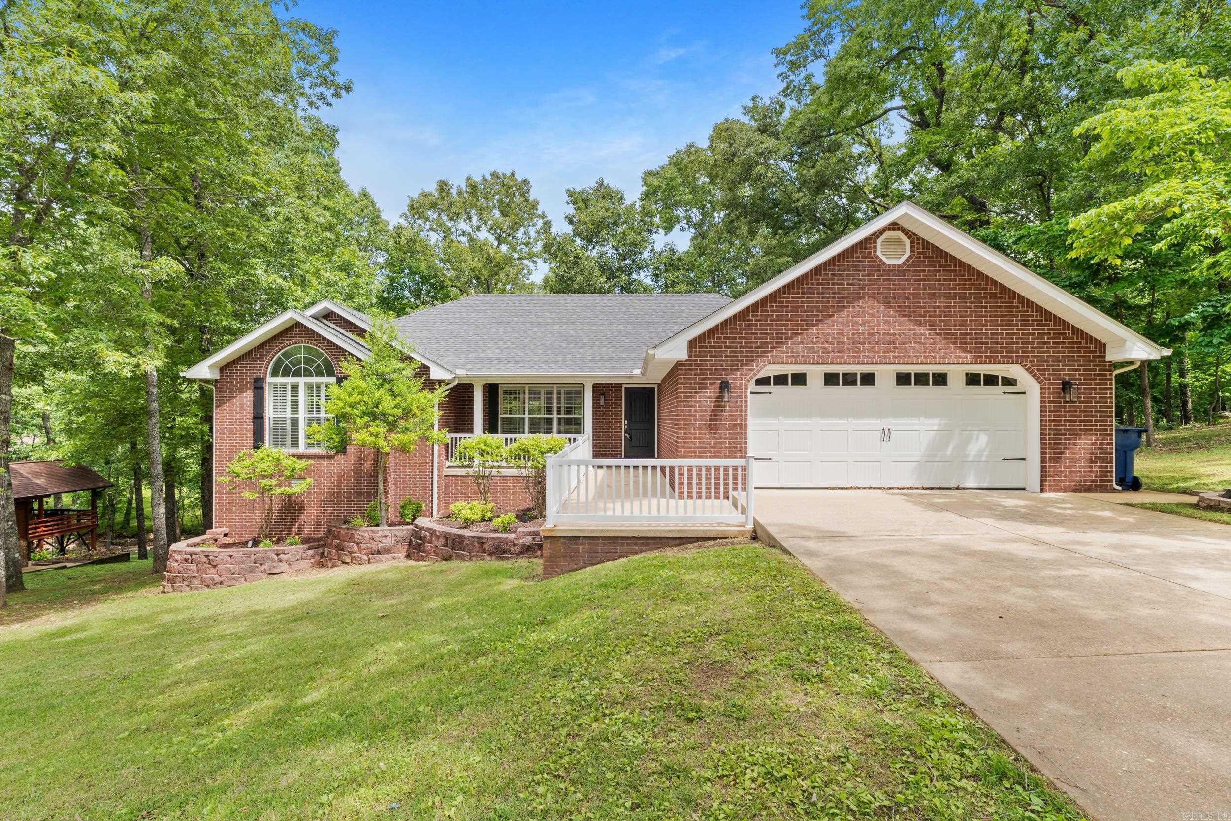 Luxury, space, and endless entertaining possibilities await in this gorgeous 3 bedroom, 3 bathroom brick and vinyl home situated on 0.65 ac m/l in the desirable Pebblecreek Subdivision. Showcasing new stainless steel and black appliances on both levels, this home is loaded with upgrades and designed for modern living. The impressive lower level features a full kitchen, dining bar, gaming area, and spacious gathering room that seamlessly open to a covered deck. The basement o ers incredible potential for a second living area, home theater, or recreation space. In the master you will find elegant tray ceilings and a spa-like primary bath with a soaking tub and walk-in shower create a touch of luxury throughout. With multiple outdoor entertainment spaces and a whole-house generator makes this property as practical as it is beautiful. This one checks all the boxes, schedule your showing today!