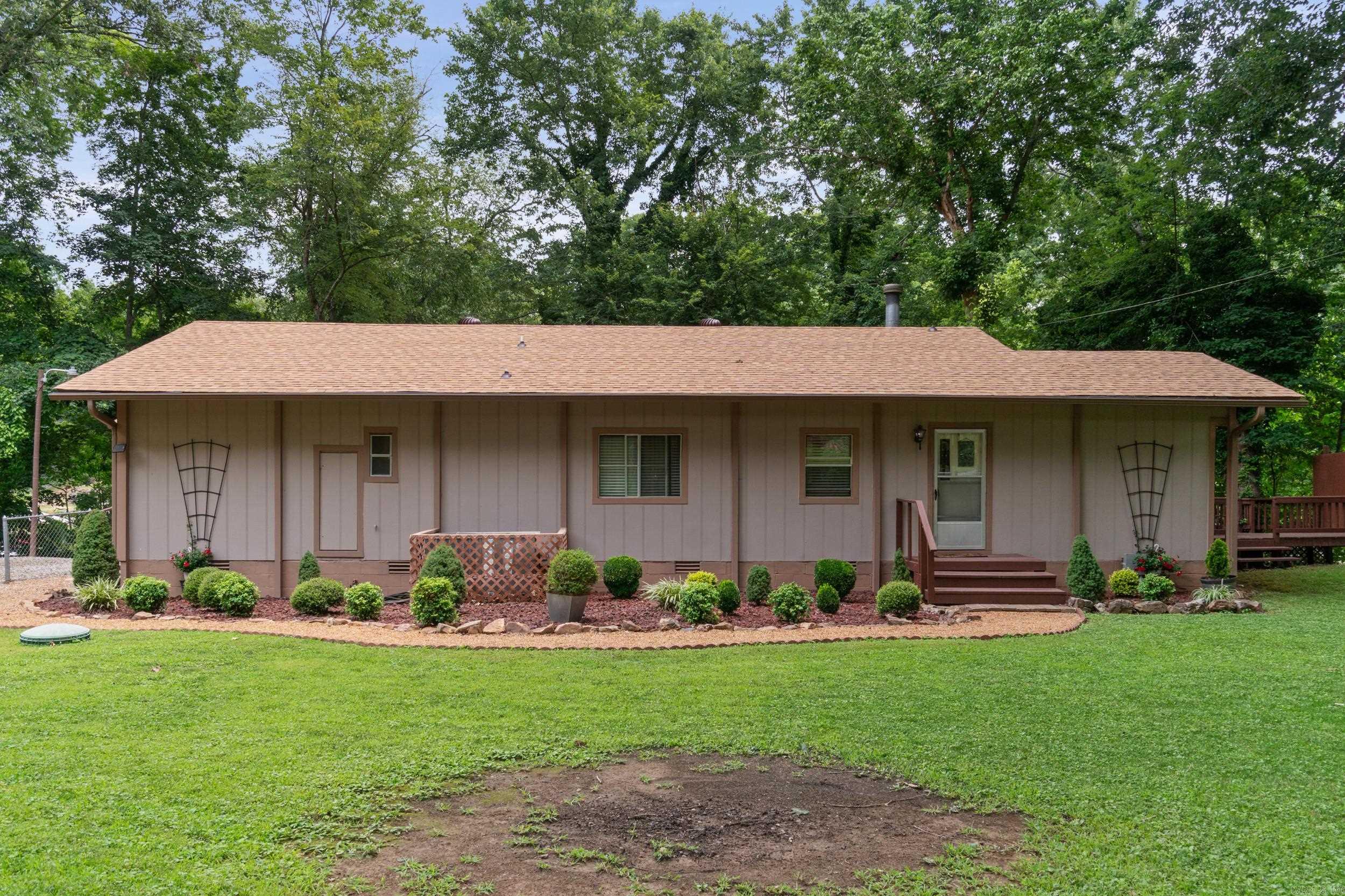 Excellent fishing! Great weekend get a way on the Little Red River, sun room with wall of windows gives you a 180 degree view of the river. Fenced yard for the dogs to run all on a private location at the end of the road, Several decks make this nice for entertaining, grilling and great for those family gatherings, Selling completely furnished except personal items. Roof new in May 2025, Exterior of the home was freshly painted just a few years ago. Modern covered Boat dock with boat slip and casting area.