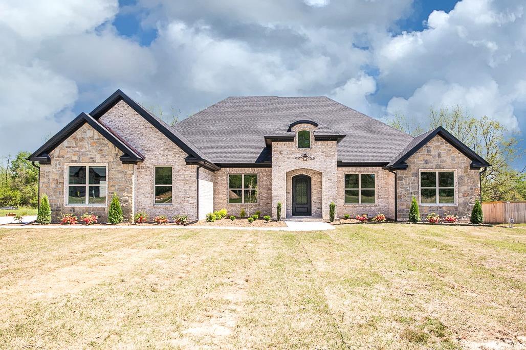 Beautiful, completed, new construction, 4BR 2.5 BA home with Rolling Hills Golf Course access. Featuring open floor plan, 10ft ceilings with stained beams and stained accents, huge walk in pantry with sink and space for extra refrigerator, large entry, laundry connected to the master closet, double vanities, separate tile shower, soaker tub, tankless water heater, gas cook top, gas log fireplace inside and outside on covered back porch, and 3 car garage. Lot is large enough for pool and shop. Don't let this one of a kind slip away! Home is complete and ready for your family. 2500 sq ft minimum in this awesome subdivision. More homes to follow. Call listing agent for more details.