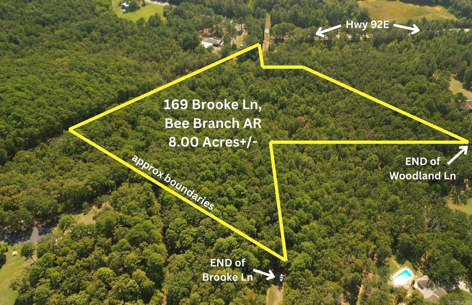 8 ACRES of PRIVACY IN THE TREES  in a convenient location with utilities to the property. Hardwood and Pine timber with deer sign that would make this a great hunting property too. Access and utilities at the end of Woodland Ln and Brooke Ln give you options on building locations. Come see this in person and fall in love for yourself.