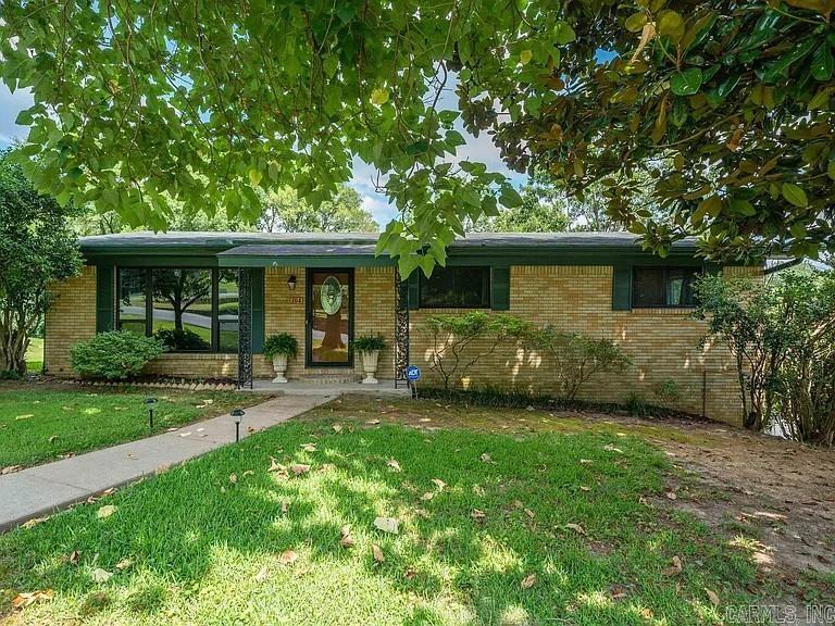 Location truly is everything with this spacious and versatile property! Situated just minutes from the highly sought-after Lakeside School District and the Hot Springs Country Club, this home offers convenience and lifestyle in one package.  Inside this 2,174 sq ft home, you’ll find plenty of room to spread out, making it an ideal option for both families and investors alike. The home features an updated kitchen with refreshed countertops, backsplash, and cabinetry, along with beautifully updated bathrooms with new flooring that add a modern touch.  Have peace of mind as this home features a whole home generator so you will not ever be without power!   The lower level offers a large open space perfect for entertaining, complete with a bar area and a full bathroom- ideal for a game room, second living area, or guest suite.  Step outside to enjoy a large deck overlooking a spacious, fully fenced backyard- perfect for relaxing, hosting gatherings, or letting pets and kids play freely.  Whether you’re looking for a place to call home or a great investment opportunity, this property checks all the boxes with its location, updates, and flexible living space!