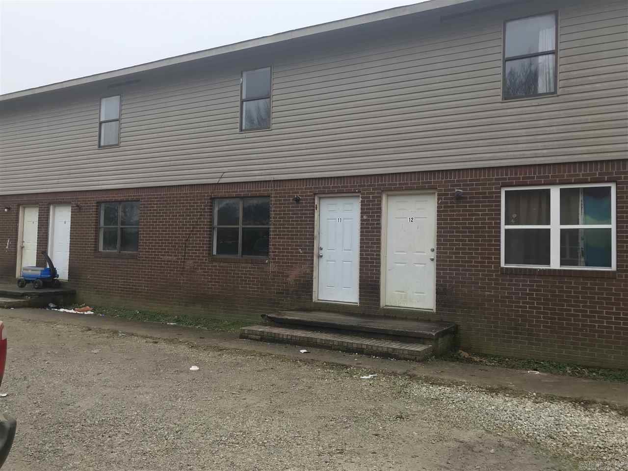 Townhouse apartment has living room, kitchen and half bath downstairs. Two bedrooms and bath upstairs. Kitchen has electric range furnished. Washer/dryer hook ups. Fridge may be furnished. Freshly painted. New flooring downstairs. Application required. Non-refundable application fee charged for tenant screening. Apply at listing office.