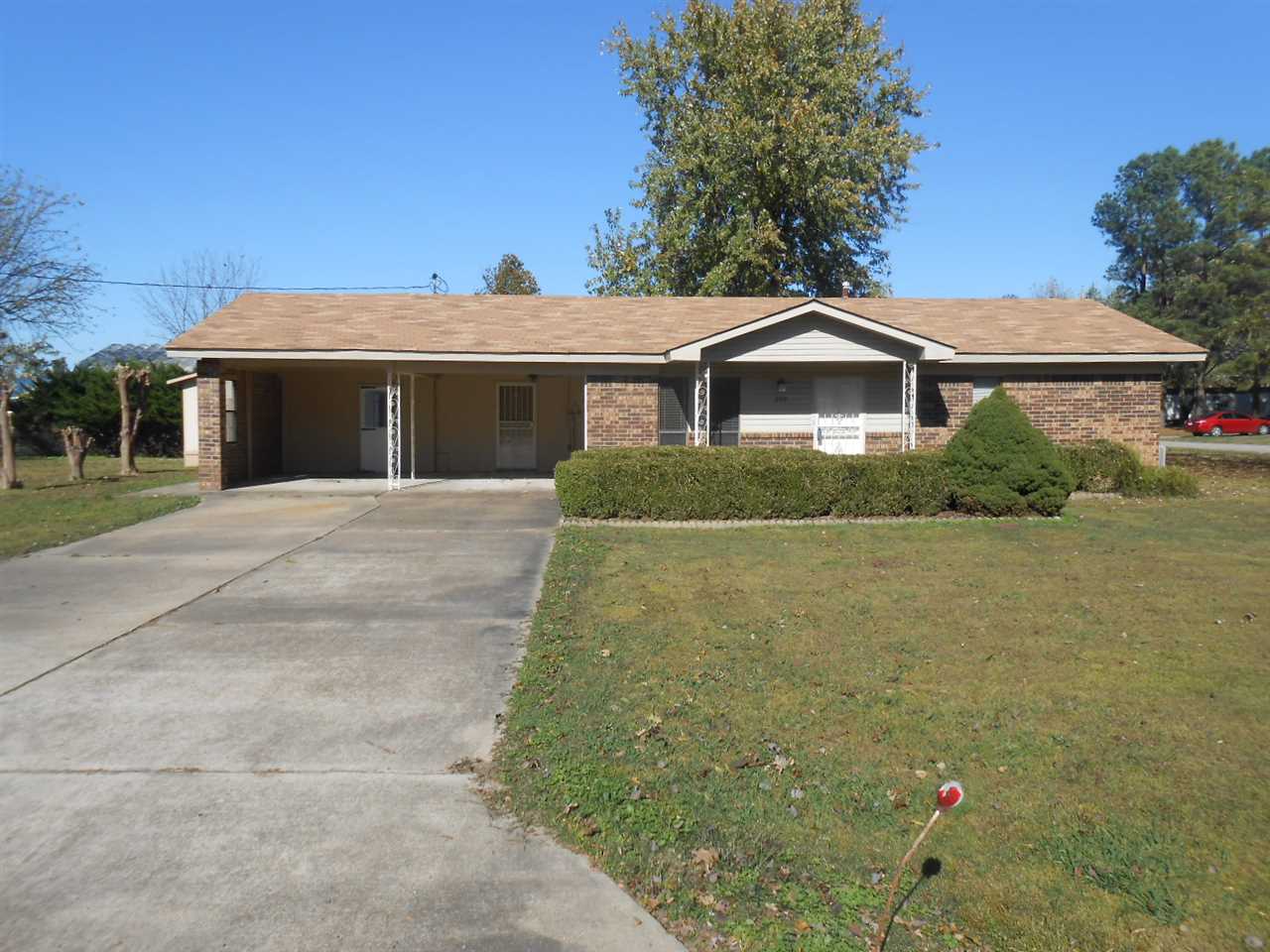 Awesome home sitting on a corner lot with 3 bedrooms and 2 bathrooms!  In Westside School District with a 2 car, carport! The bedrooms have large closet space! It has a storage building up next to the house with electricity ran to it. It also has a 30x50 steal building/shop on the back lot with electricity and water ran to in with a half bath inside. The kitchen has new counter tops, electric stove, dishwasher and refrigerator. There is also a storm shelter right behind the house!